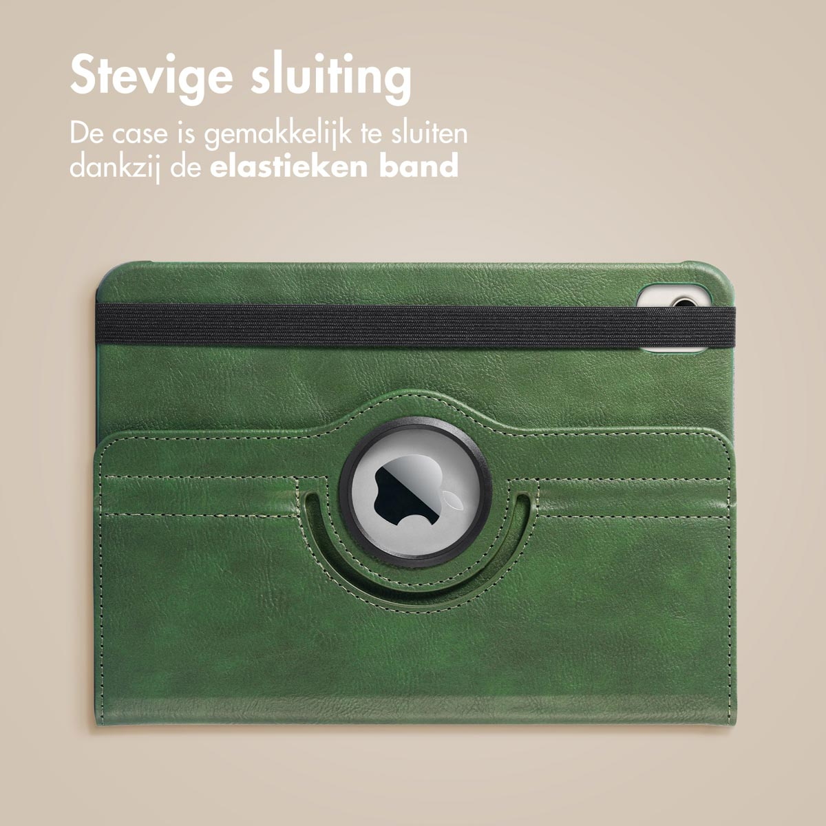 Green leather case with black elastic band, and a silver circular Apple AirTag.