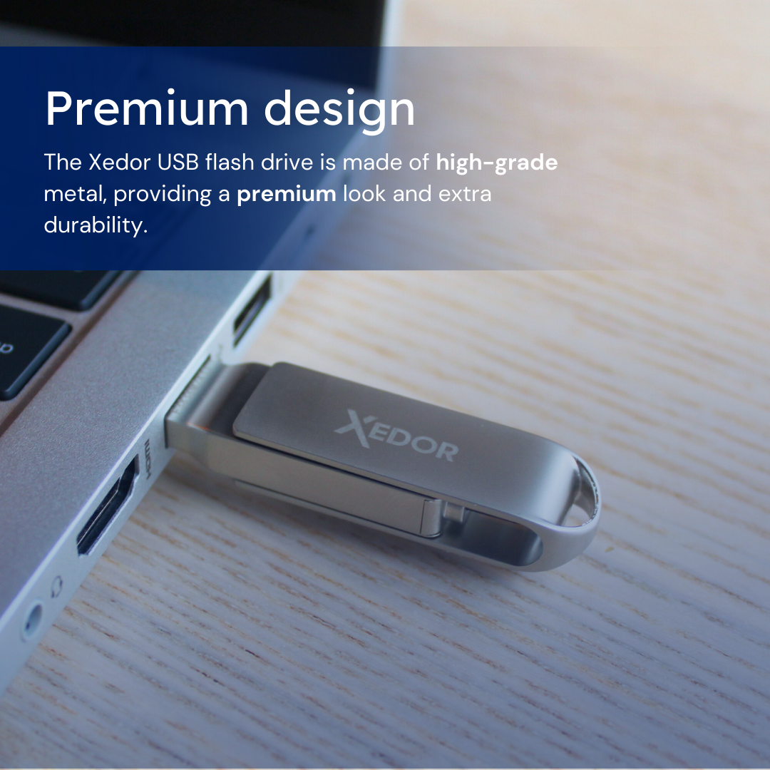 Srebrny dysk flash USB włożony do laptopa, tekst opisuje jego wygląd premium.