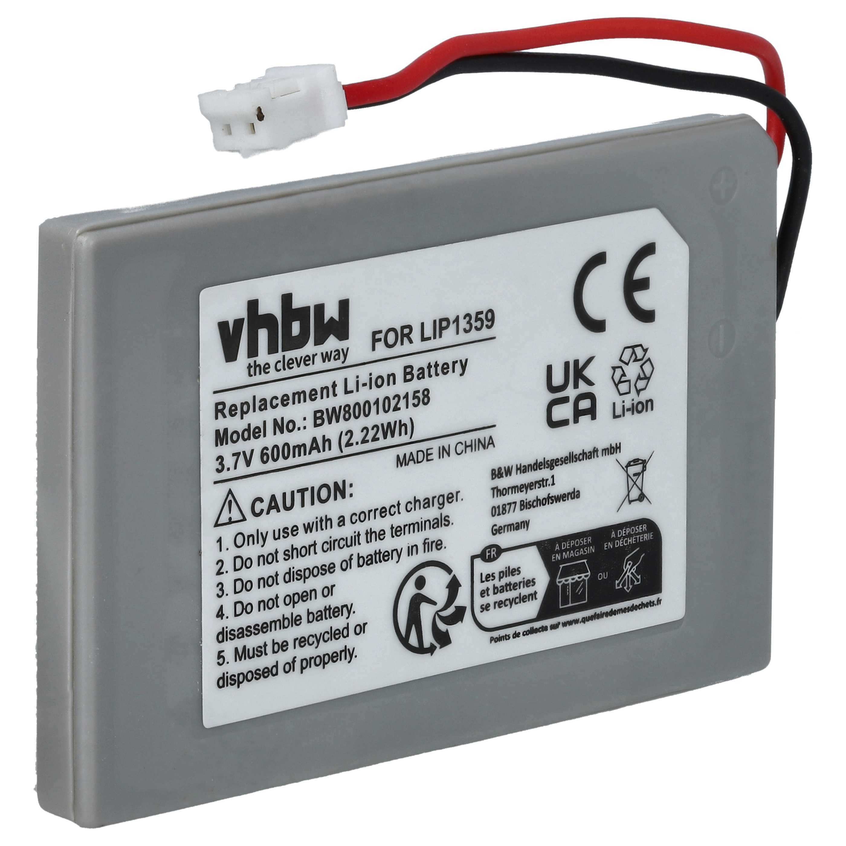Graue Batterie mit weißem Stecker und schwarzen und roten Drähten. Vorsichtsetikett vorn.