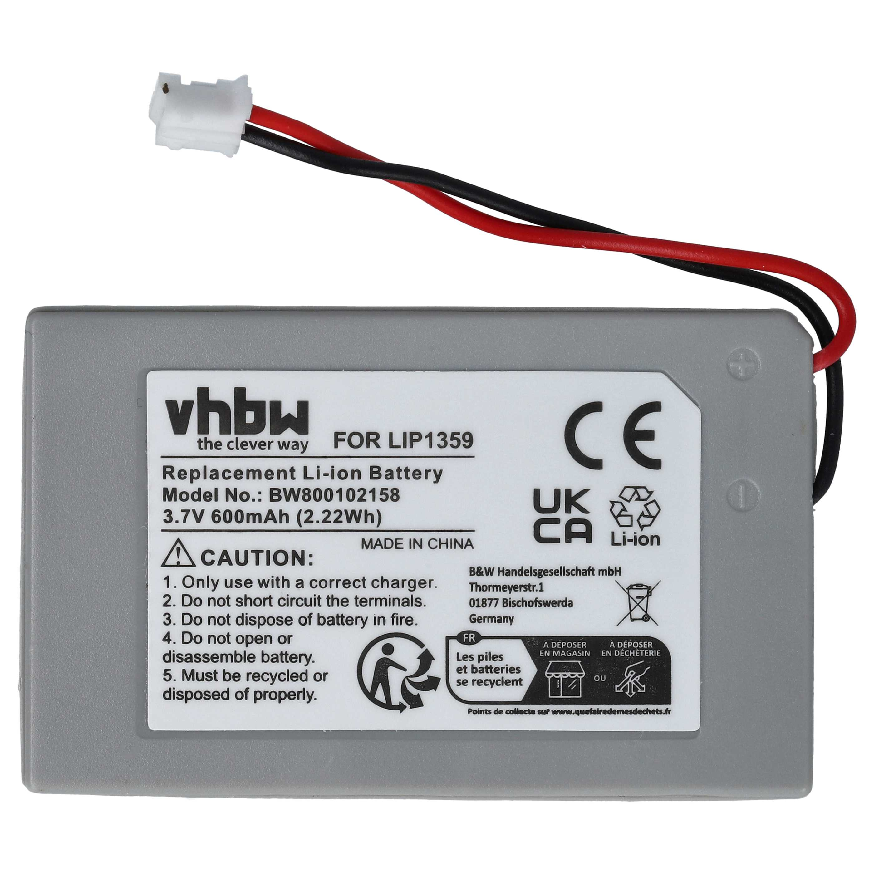 Graue Batterie mit schwarzen und roten Drähten und einem weißen Stecker. Es hat Text auf Englisch.