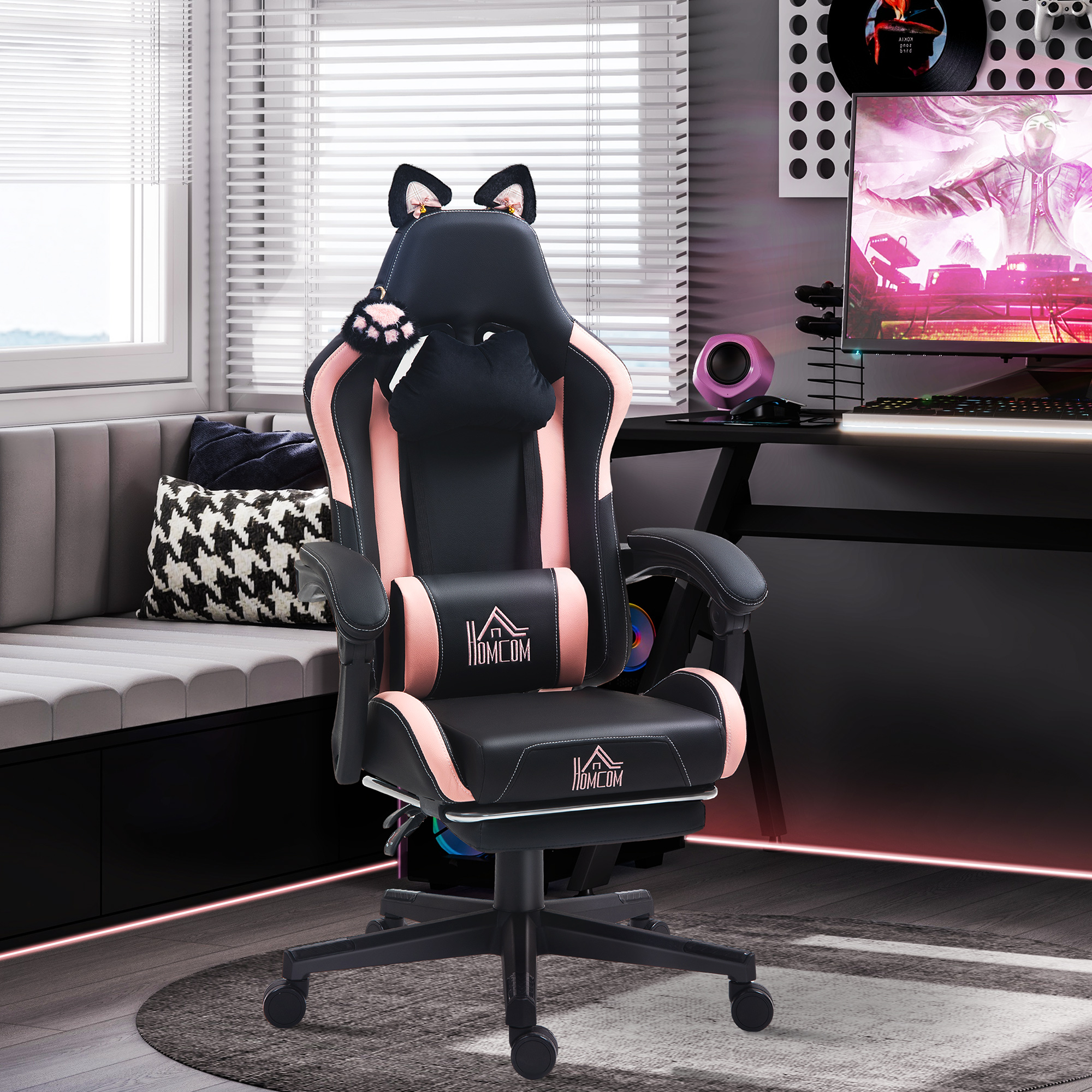 Sedia da gaming, nera e rosa, orecchie da gatto, in un ambiente da gioco.