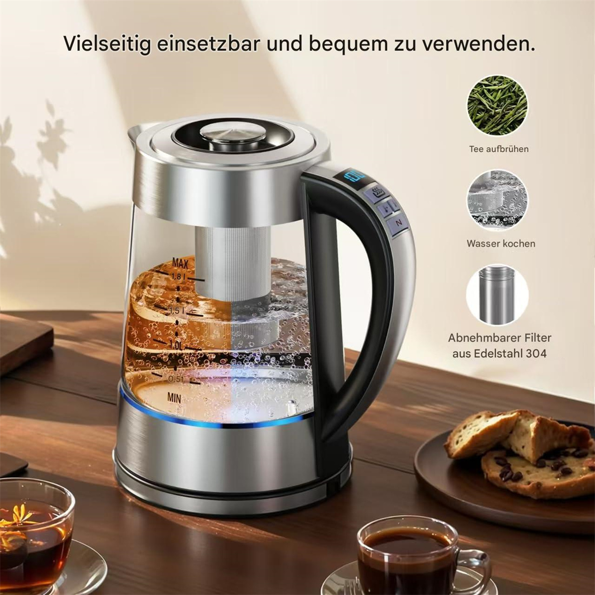 Ein silberner Wasserkocher mit Tee und Kaffee, und einem herausnehmbaren Filter.
