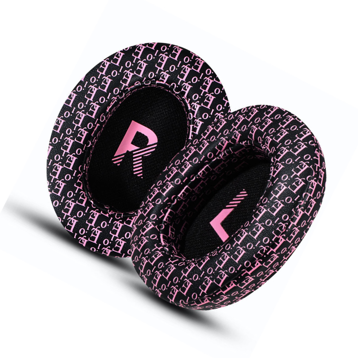Zwei Kopfhörerkissen mit rosa Buchstaben auf Schwarz. Die Kissen sind oval und mit 'R' und 'L' markiert.