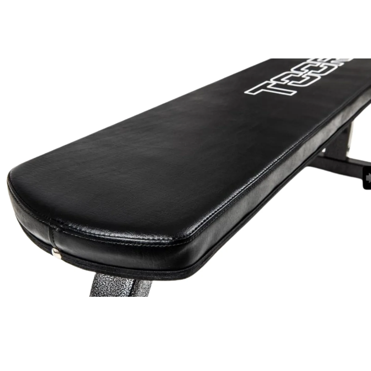 Black workout bench with a black padded surface, a metal frame, and the brand name 'TGG' visible.