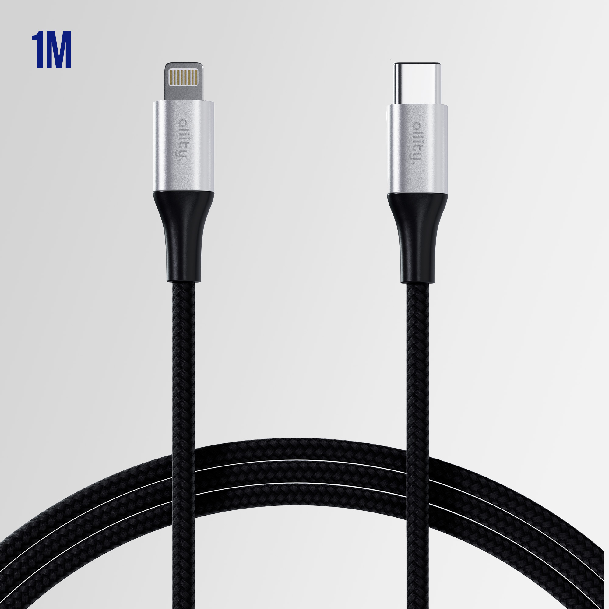 Dwa srebrne i czarne kable ładujące obok siebie. Jeden ze złączem Lightning, jeden z USB-C.