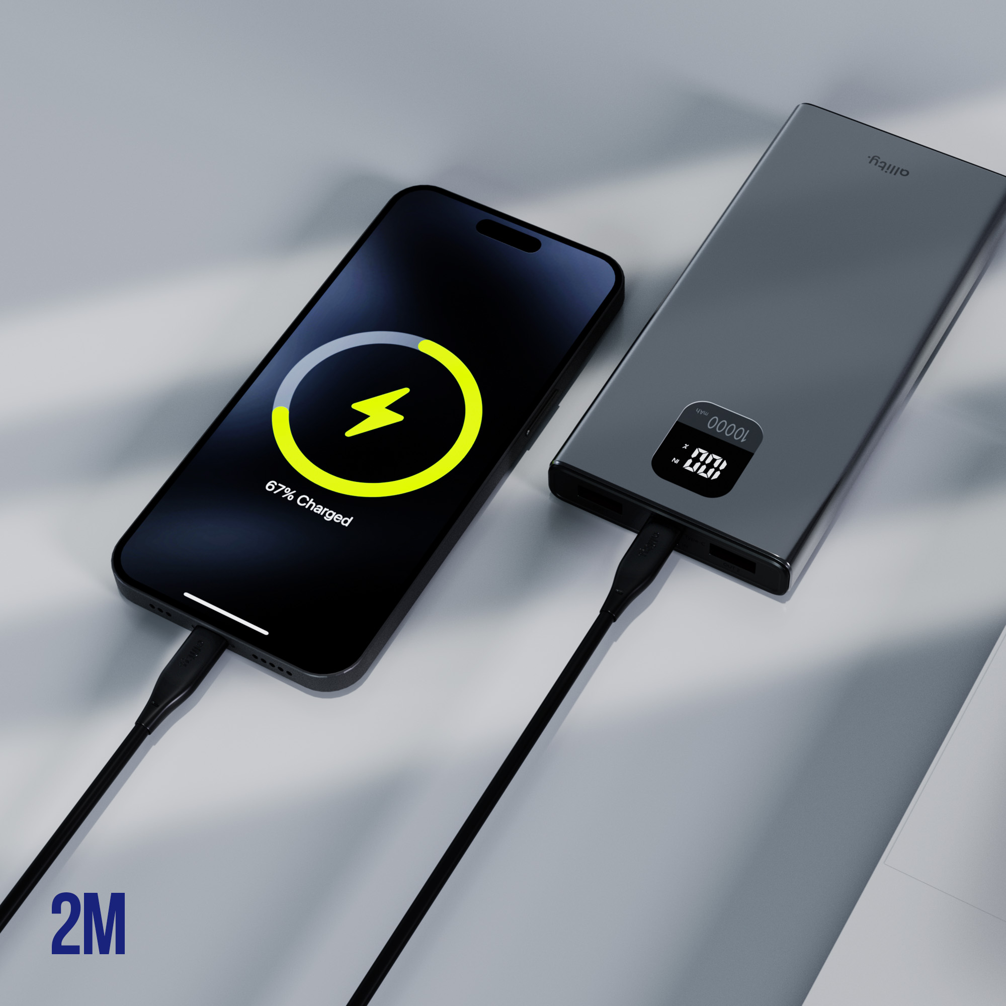 Telefon ładuje się za pomocą czarnego power banku i kabla ładującego.