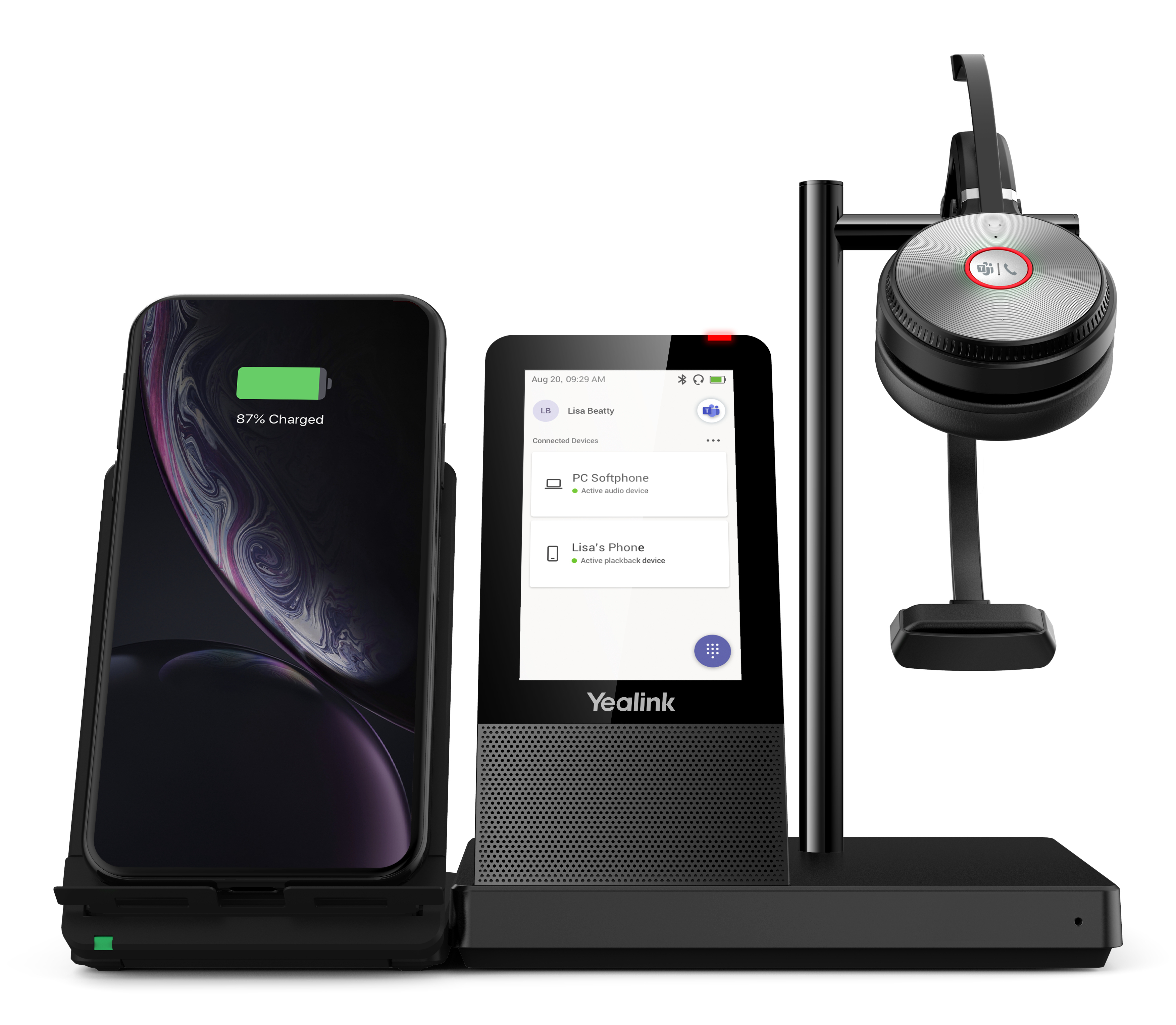 Een zwart draadloos oplaadstation met een telefoon en een apparaat met een headset, op een witte achtergrond.