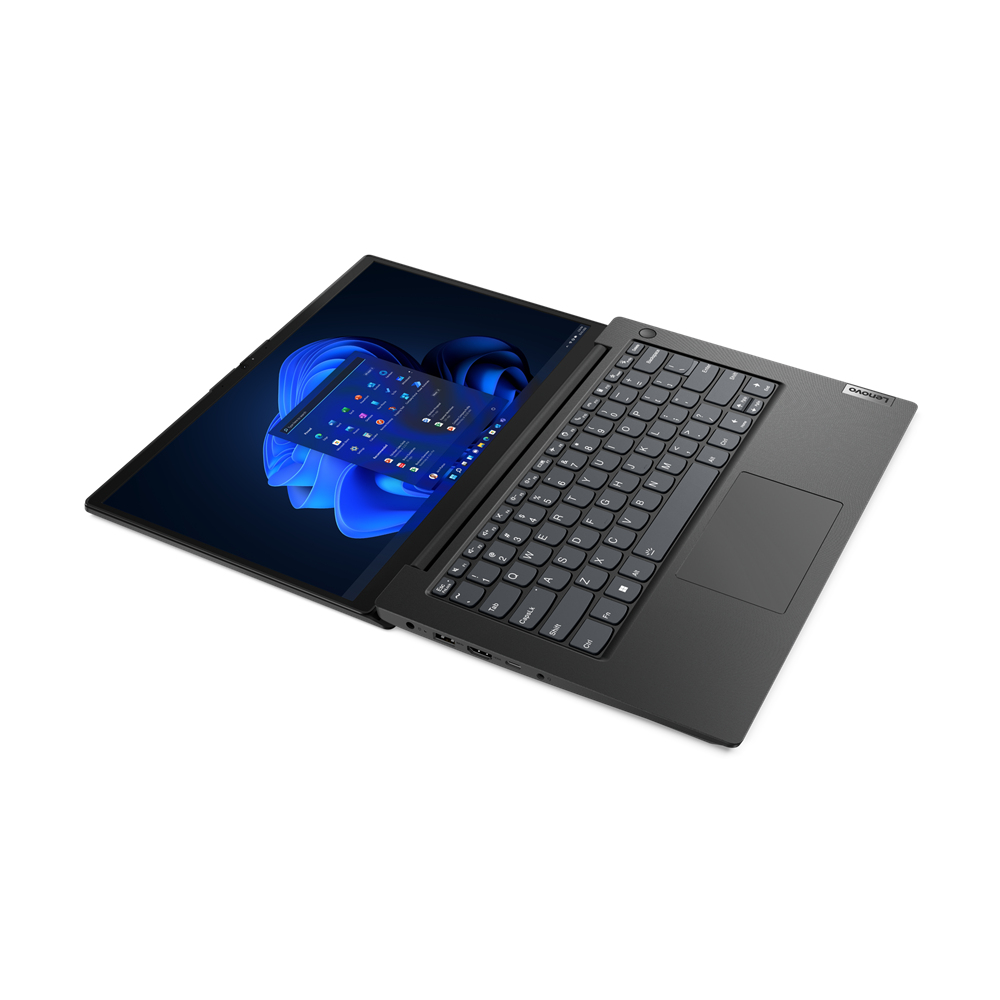 Mavi bir Windows 11 arka planı gösteren, ekranı açık bir dizüstü bilgisayar. Klavye görünür durumda.