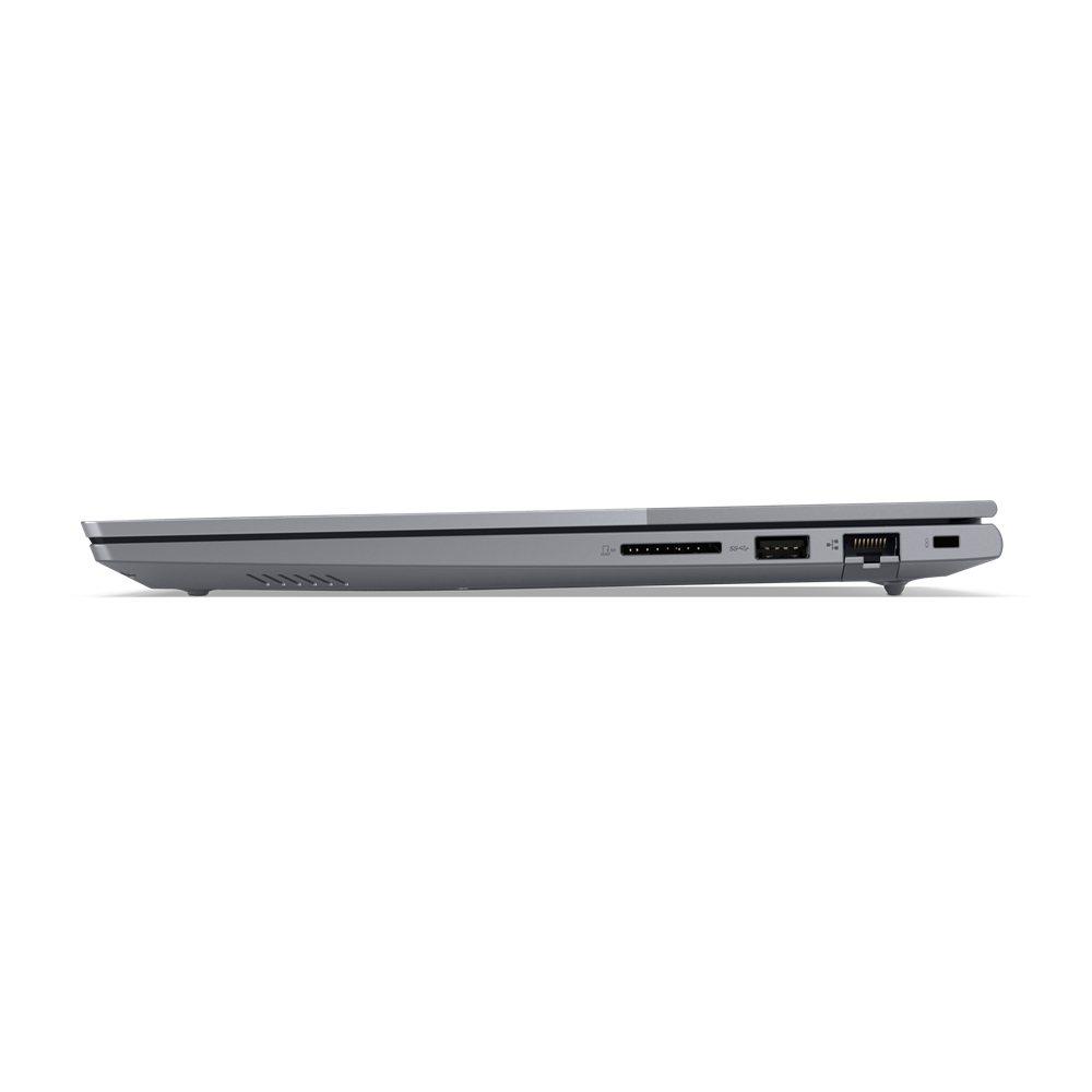 Vista laterale di un laptop grigio, con porte sul lato. Isolato su sfondo bianco.
