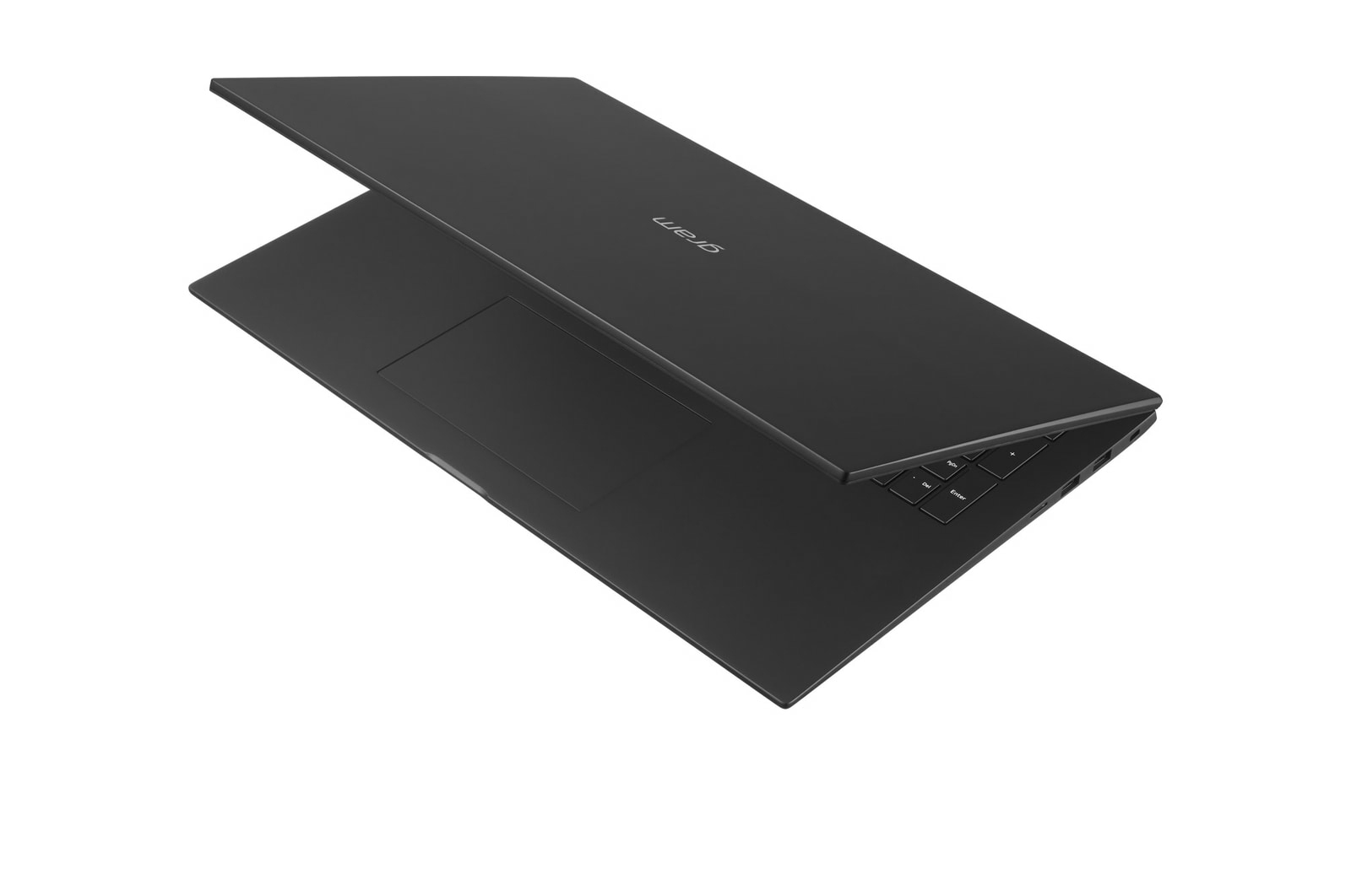 Una computadora portátil negra, vista superior, con la tapa ligeramente abierta.