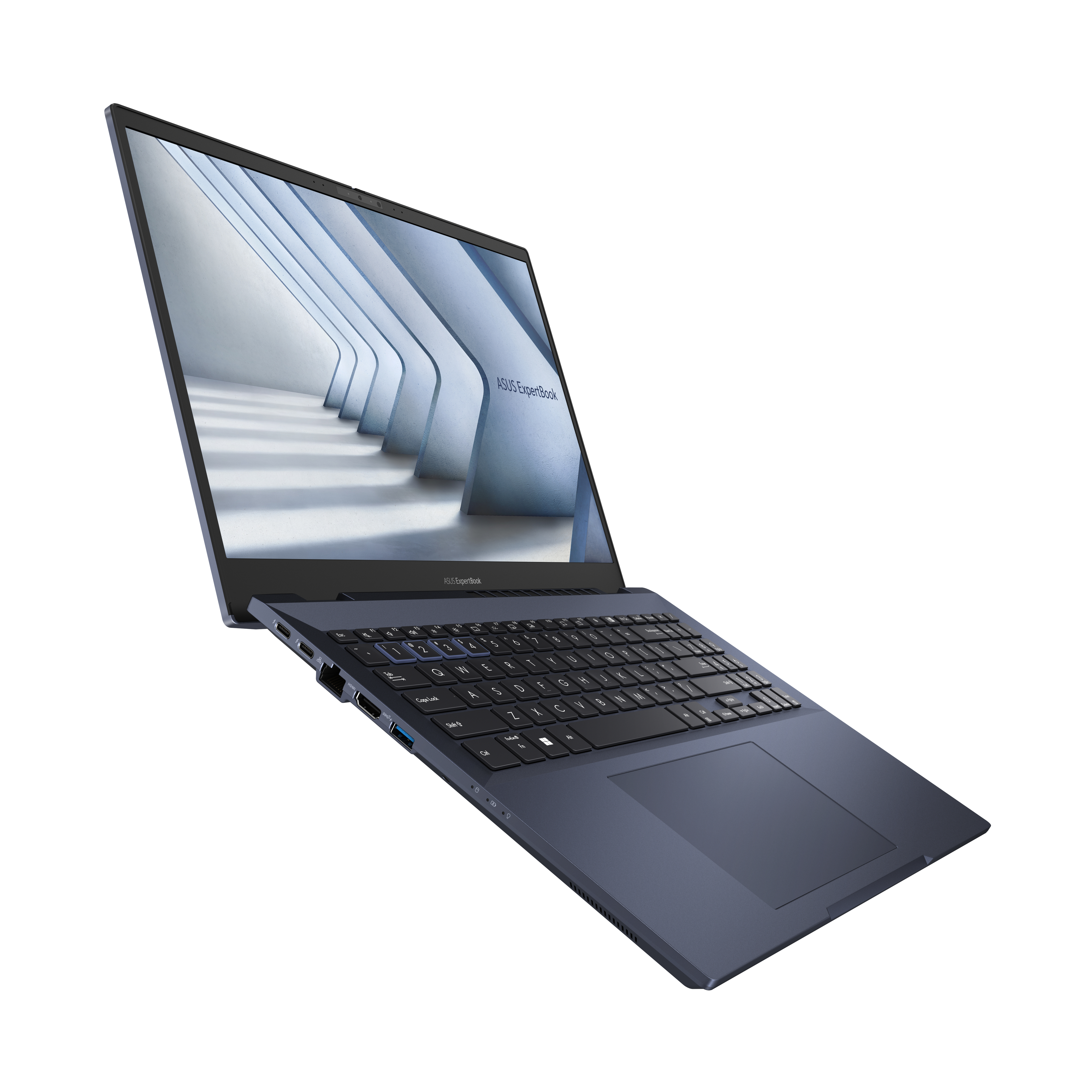 Laptop ASUS blu scuro aperto ad angolo. È su una superficie bianca, con un muro azzurro sullo sfondo.