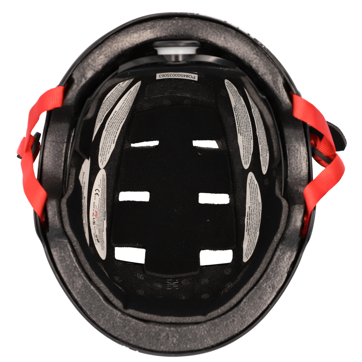Draufsicht auf einen schwarzen Helm mit roten Riemen und Polsterung vor einem weißen Hintergrund.