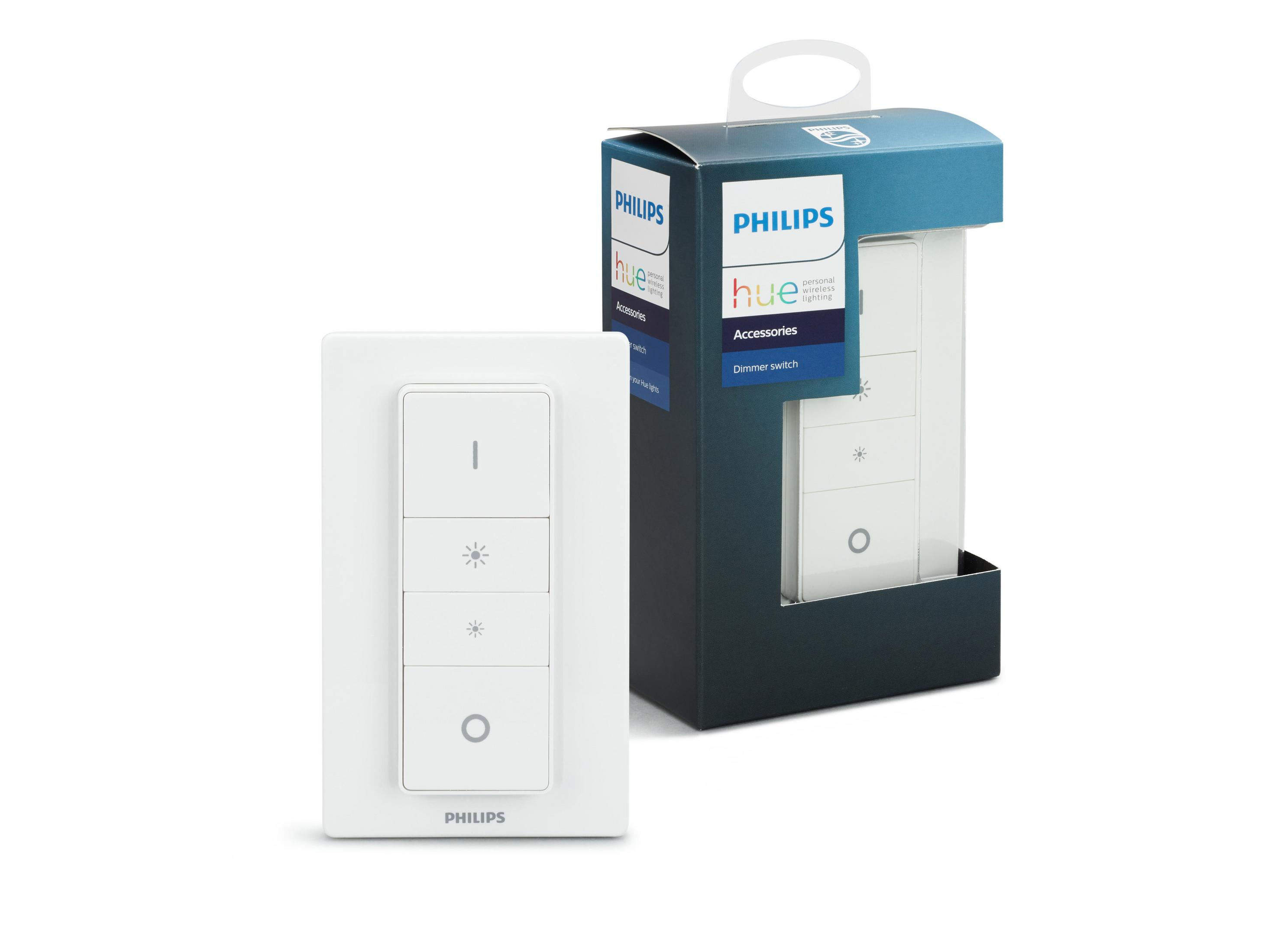 Weißer Philips Hue Dimmschalter. Eine Box rechts zeigt das Produkt in seiner Verpackung.