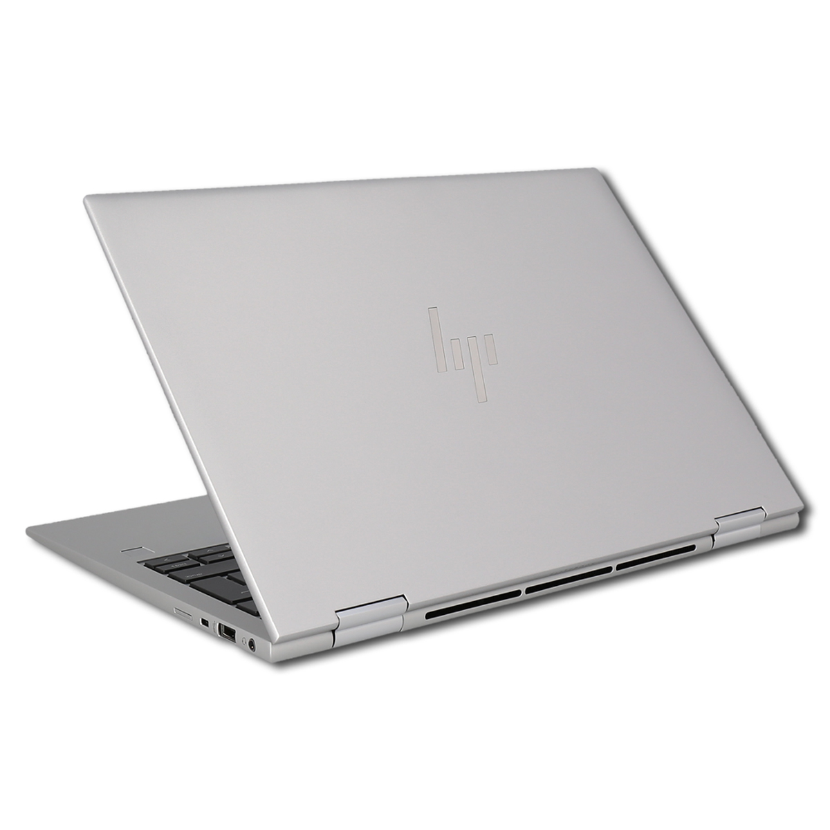 Laptop argentato, vista posteriore, parzialmente aperto. Logo HP visibile. Tastiera nera.