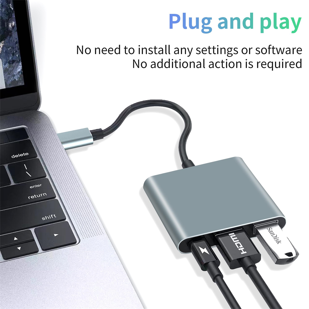 Ein Laptop, verbunden mit einem Hub mit mehreren Kabeln und einem eingesteckten USB-Laufwerk.