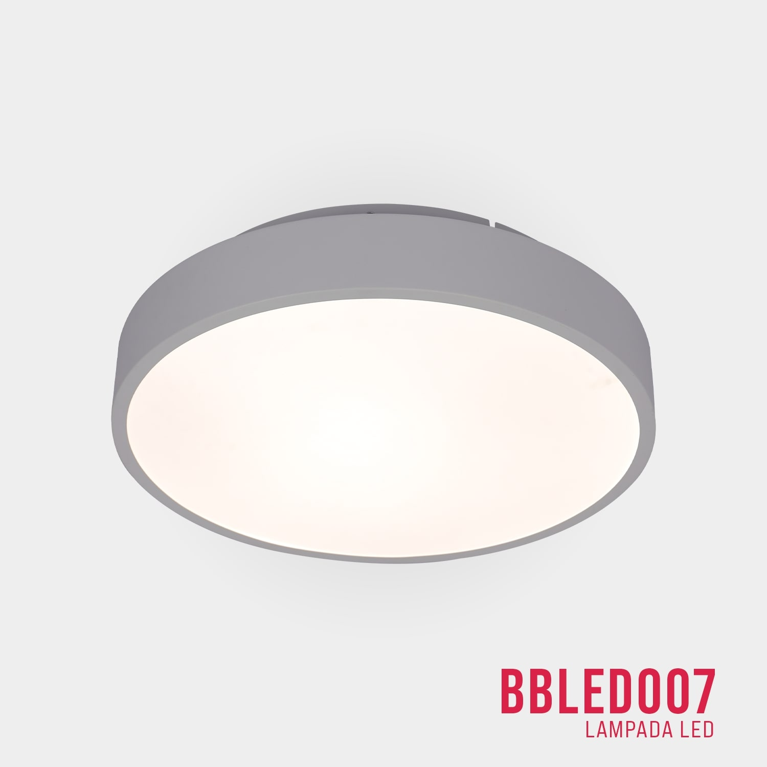 Plafoniera rotonda grigia con centro bianco brillante.