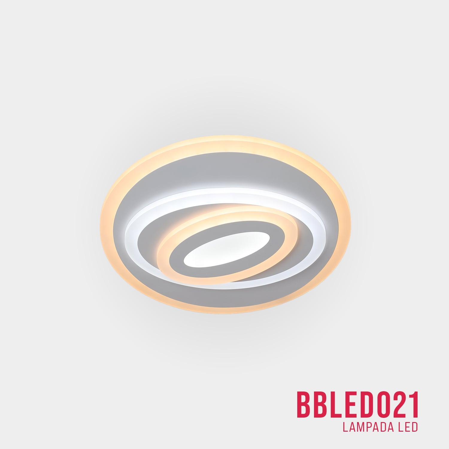 Lampada da soffitto moderna con design ovale. Forme ovali bianche e gialle visibili.