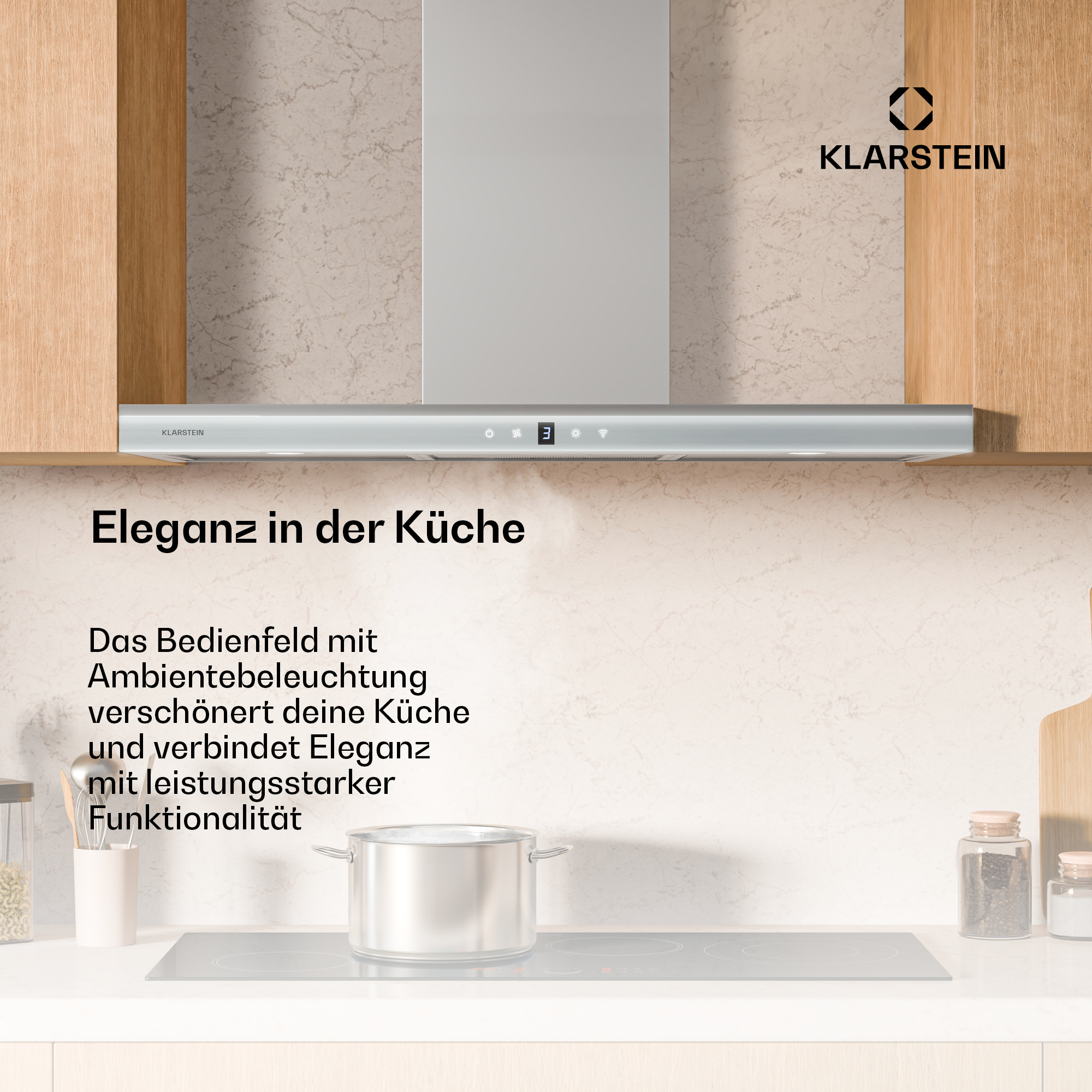 Eine moderne Küche mit einer Dunstabzugshaube über einem Kochfeld und einem Topf, Eleganz zeigend.