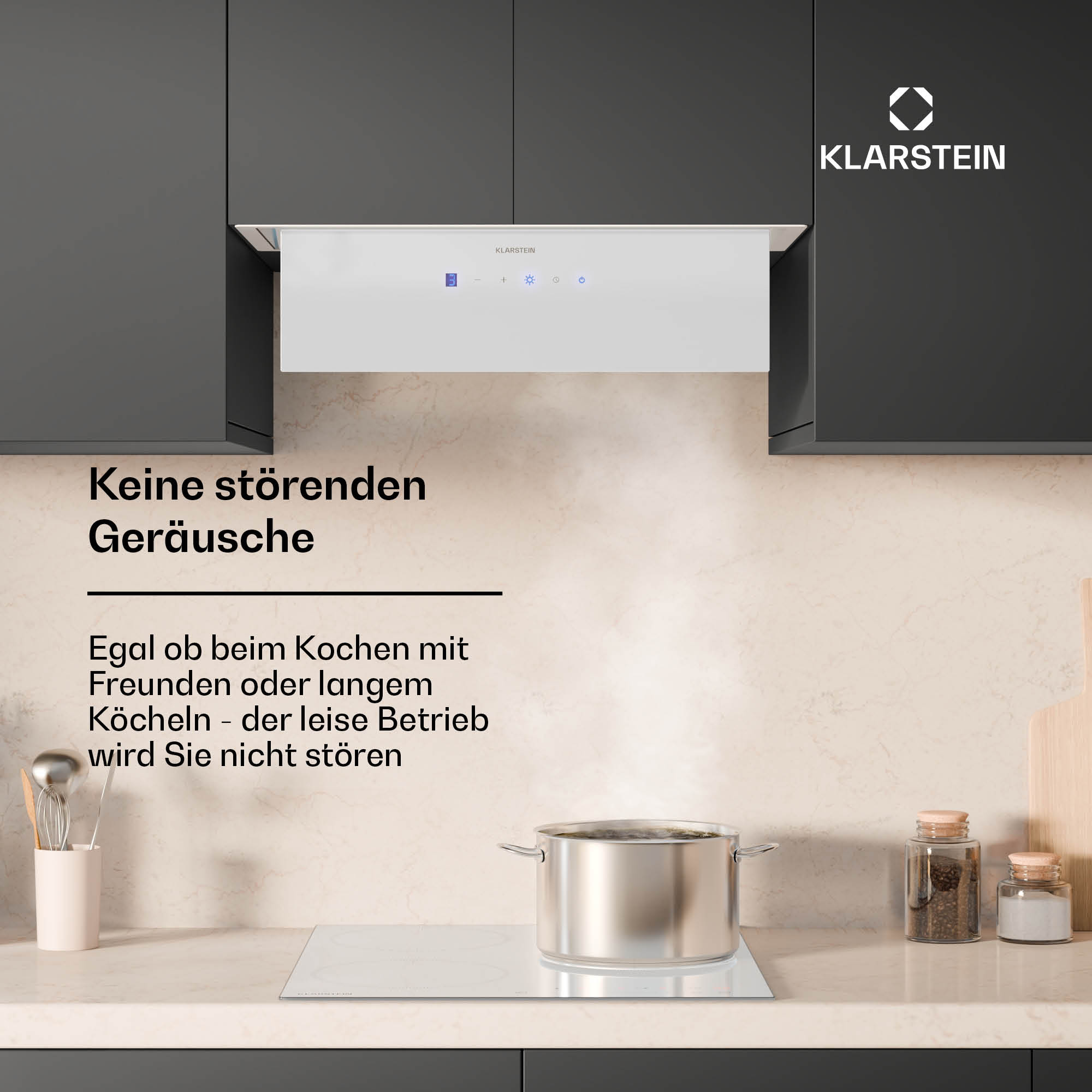 Weiße Küchenhaube über einem Herd. Text auf Deutsch über leisen Betrieb.