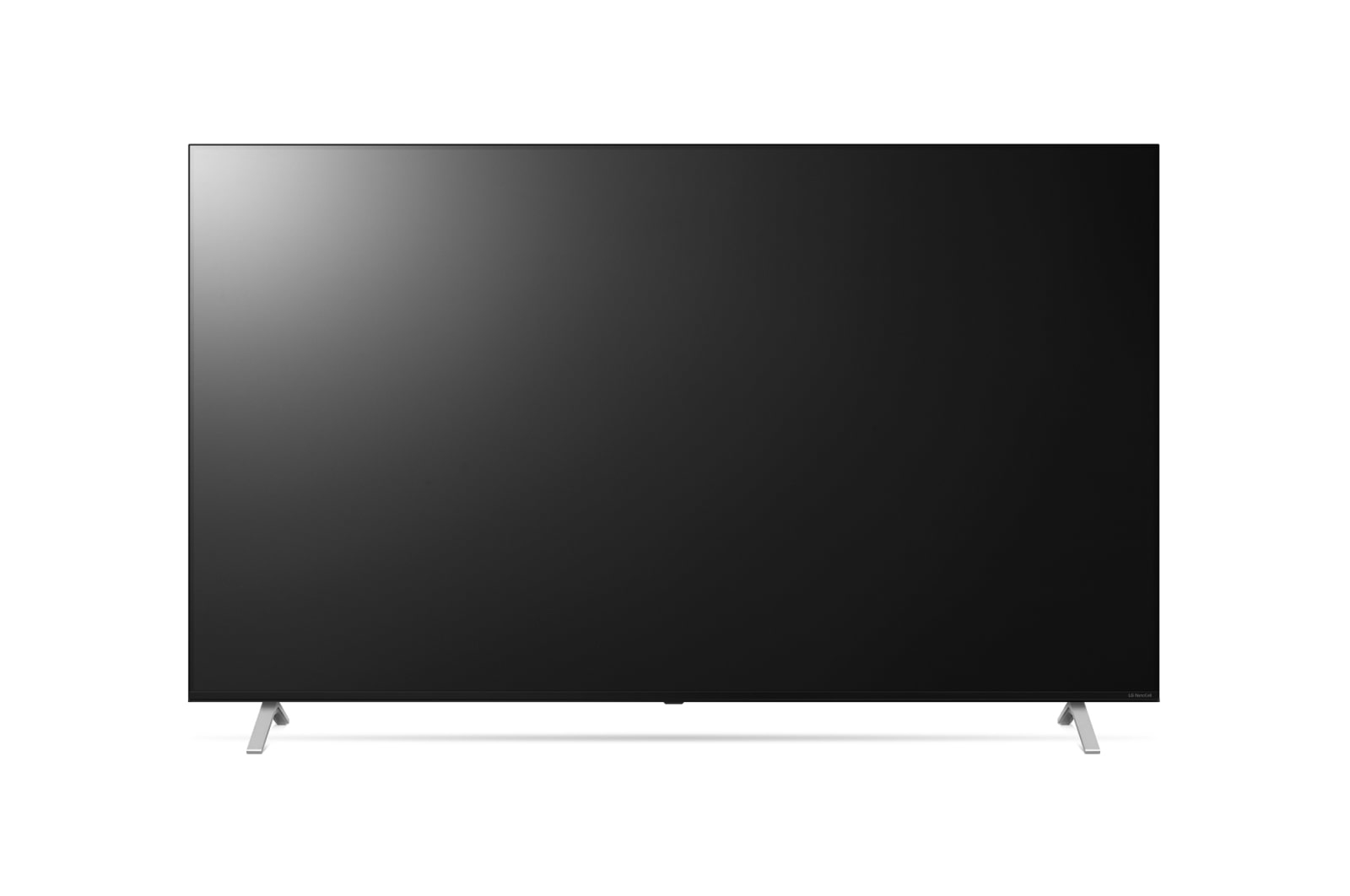 Una TV nera su sfondo bianco, che mostra un tramonto sulle dune di sabbia.