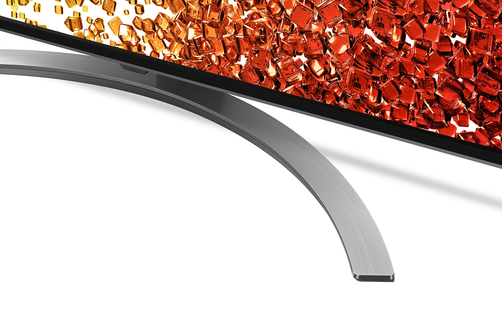 Zakrzywiona podstawa i krawędź telewizora, białe tło, zbliżenie.