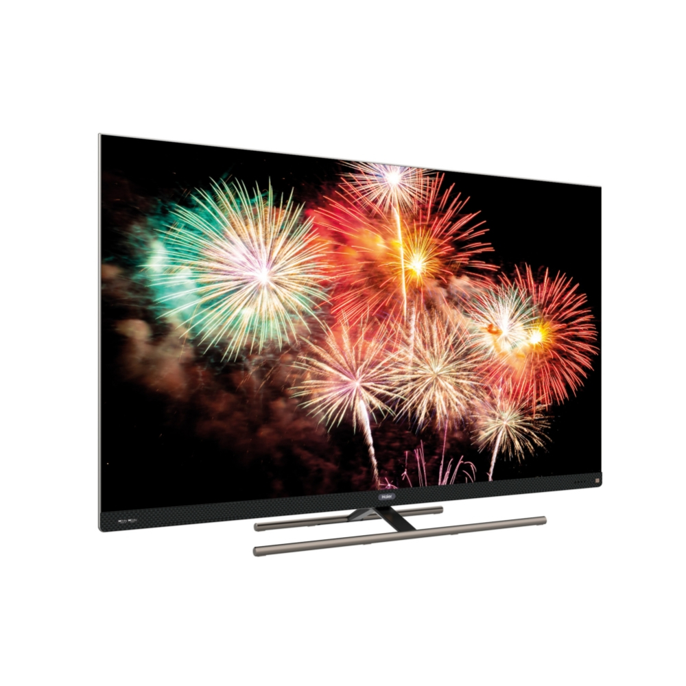 Un televisor mostrando fuegos artificiales sobre un fondo negro, ligeramente angulado.