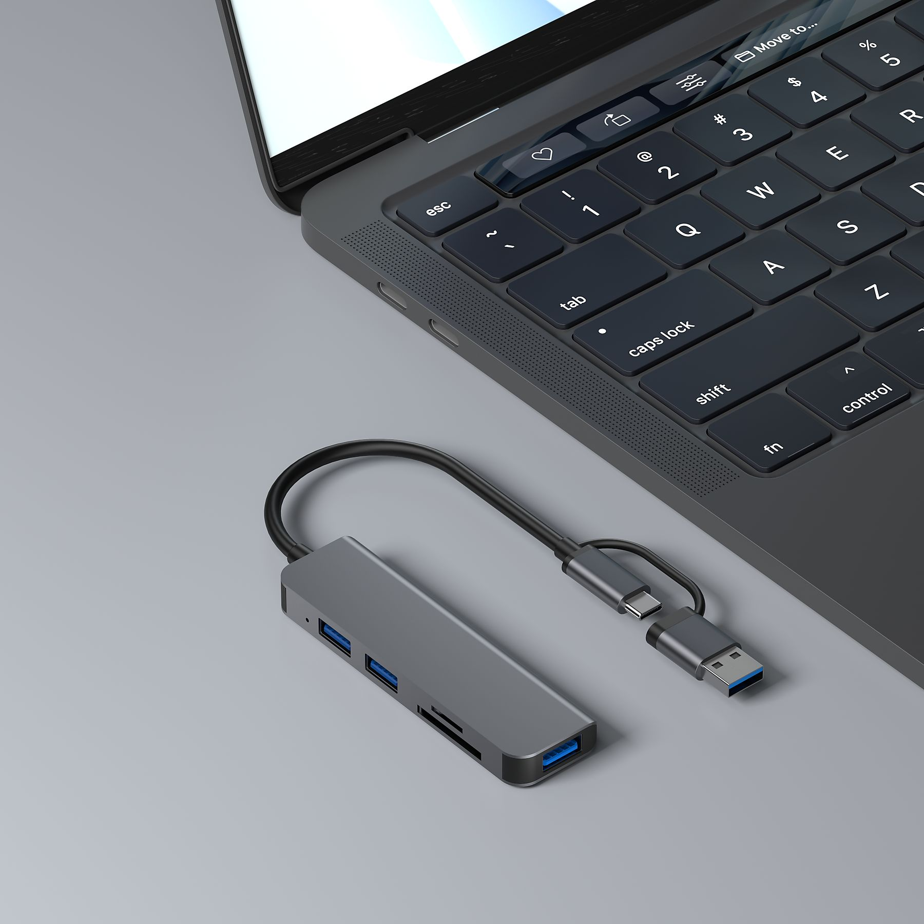 Ein grauer USB-C-Hub mit mehreren Anschlüssen, der mit einem Laptop verbunden ist.