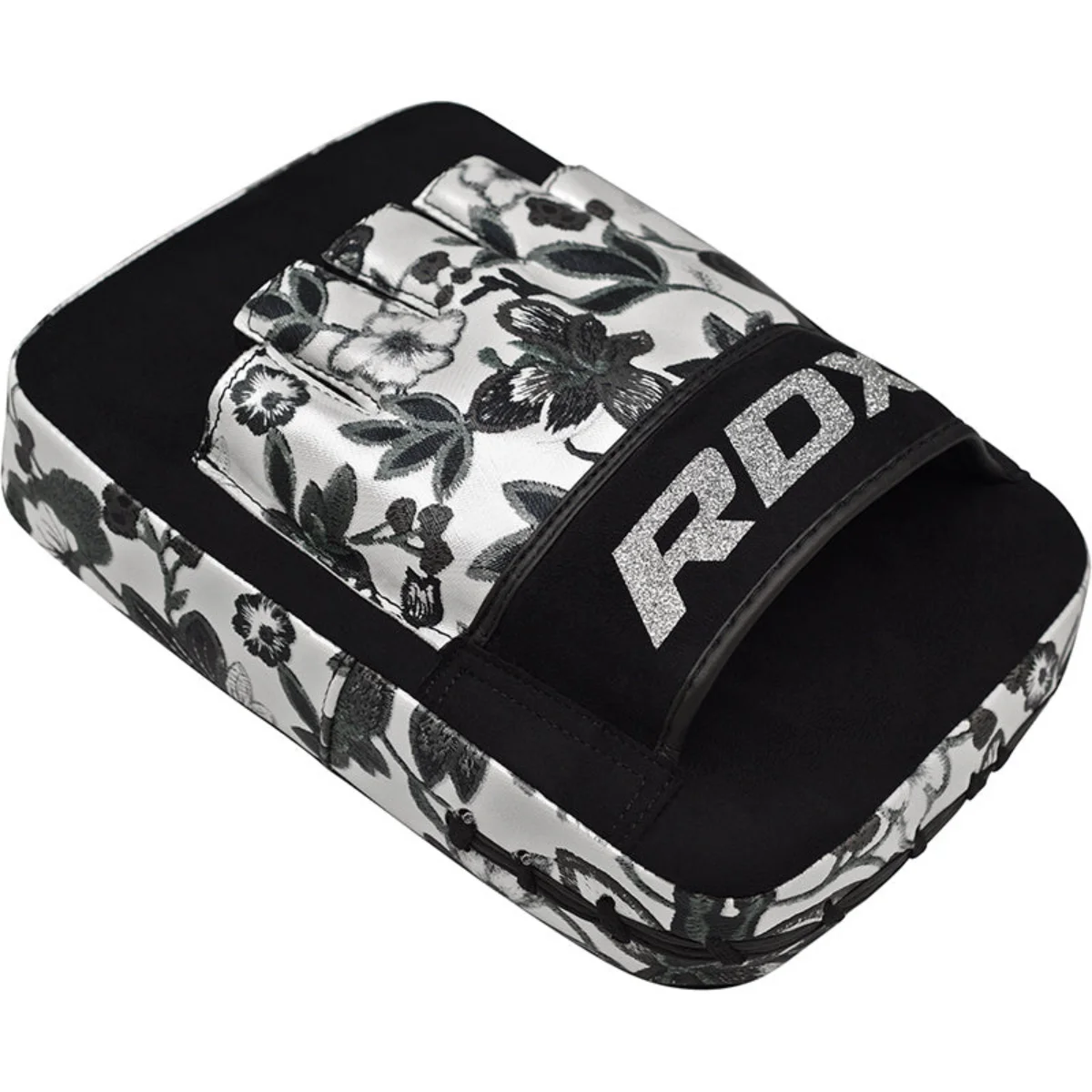 Black and white floral RDX kickboxing pad with silver logo and handle.