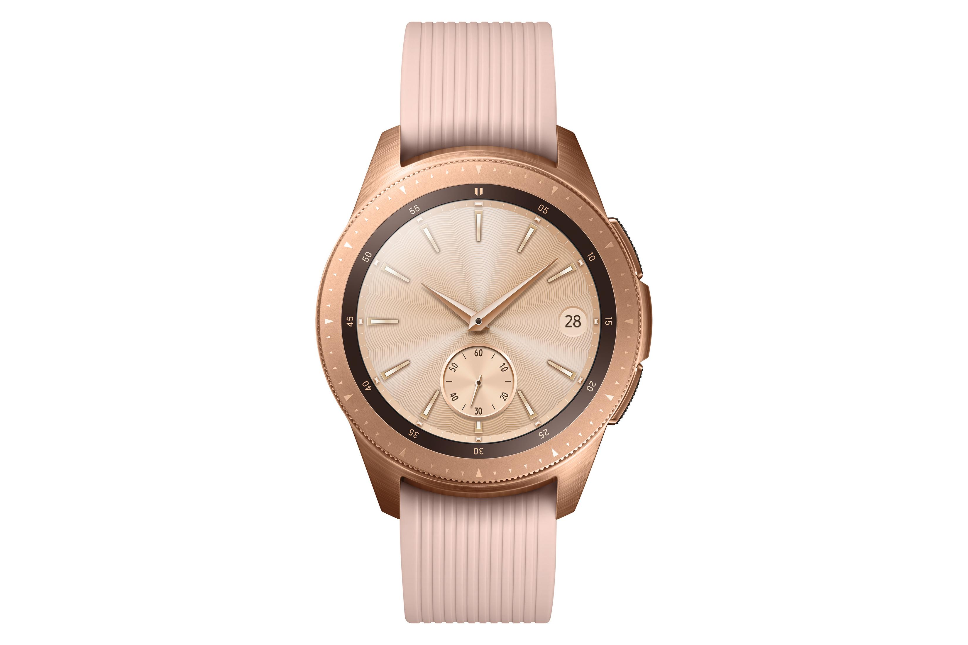 Eine hellrosa Smartwatch mit rosa Armband auf weißem Hintergrund.
