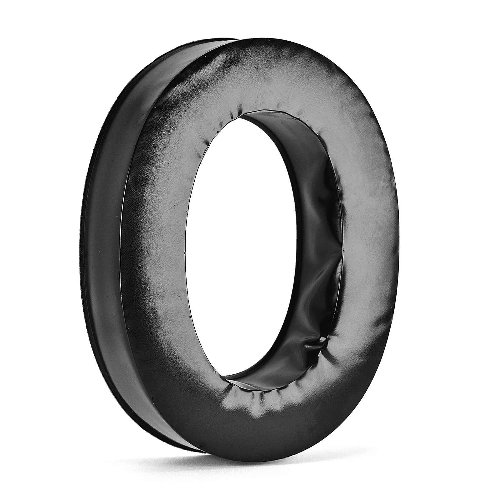 Czarna, okrągła poduszka na uszy do słuchawek z centralnym otworem.