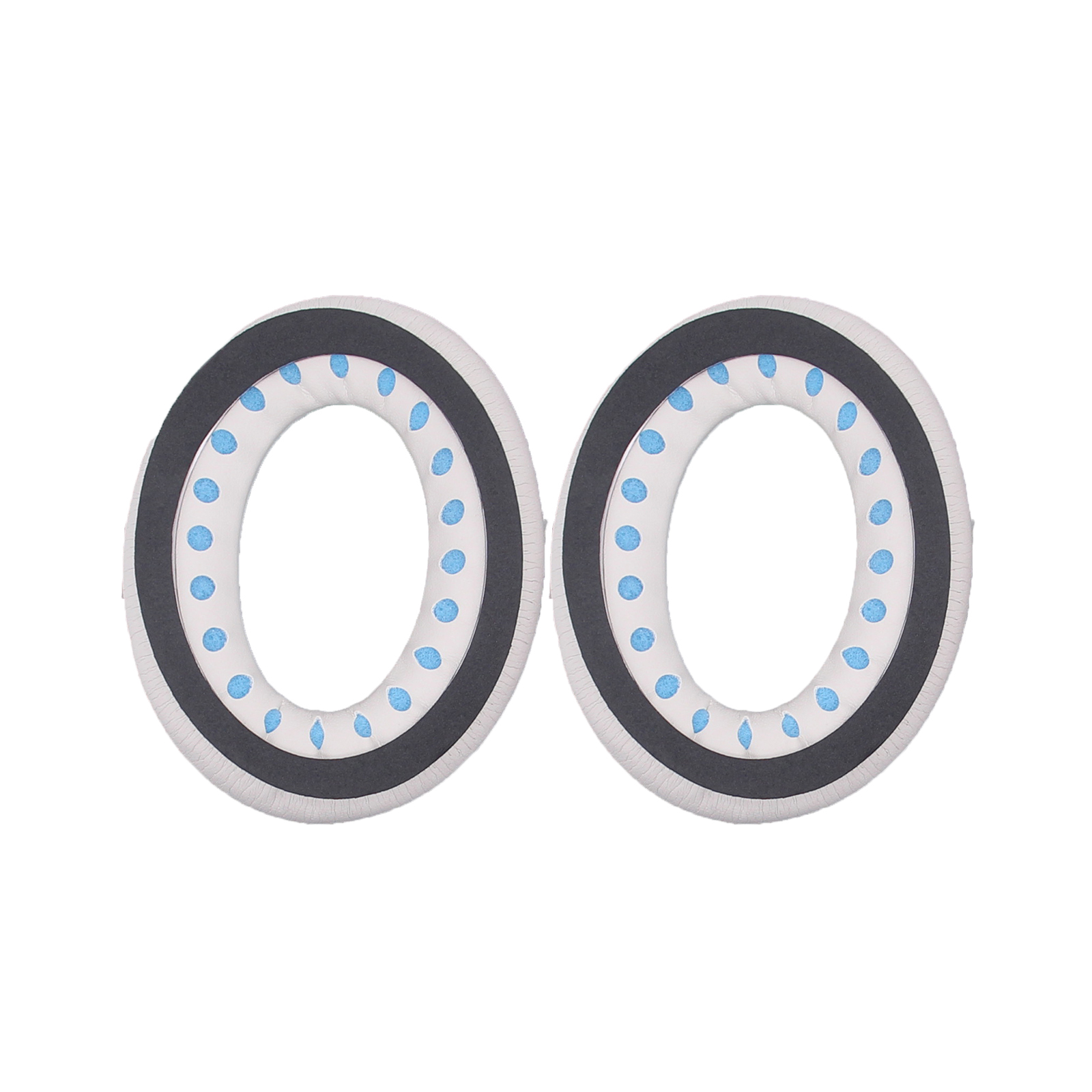 Dwie owalne poduszki na uszy z białymi środkami i niebieskimi kropkami, z szarymi i czarnymi krawędziami zewnętrznymi.