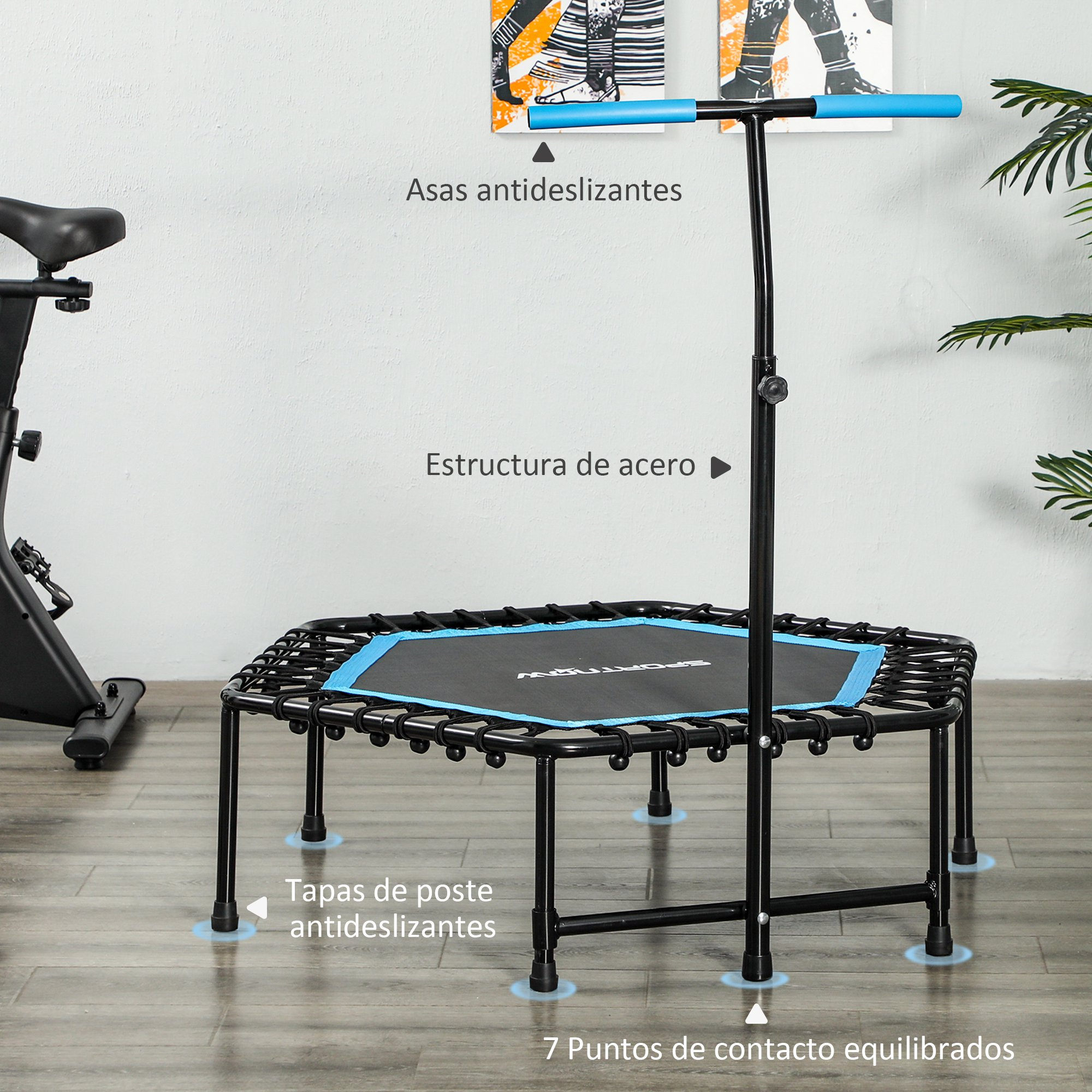 Un trampolín negro y azul con asa. Etiquetas de texto. El trampolín está en un suelo de madera.