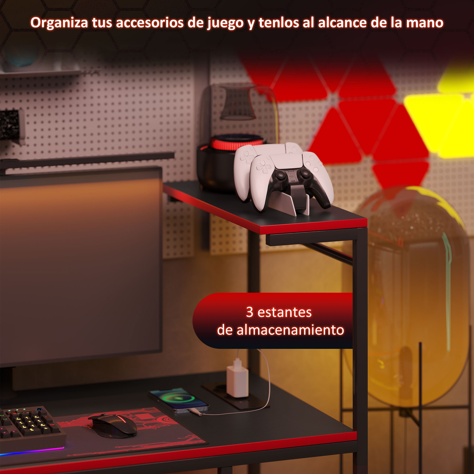 Escritorio con ordenador, teléfono cargando y soporte para mando. Acentos rojos y negros.