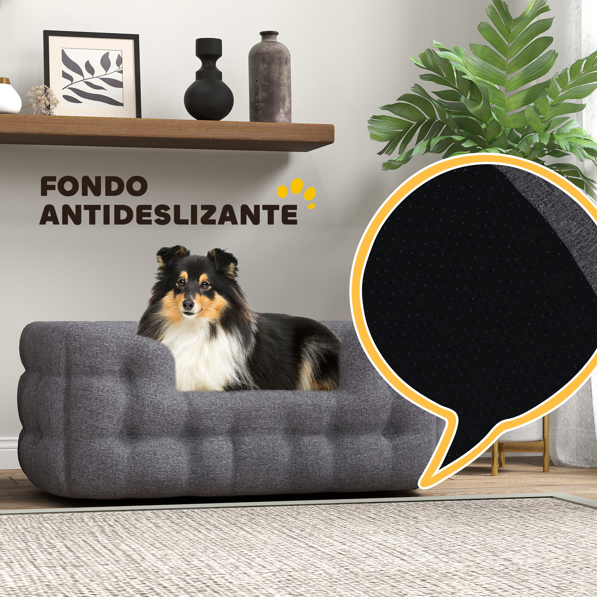 Cama para perros en una habitación. Un perro está acostado en la cama. La cama es gris y tiene una base antideslizante.
