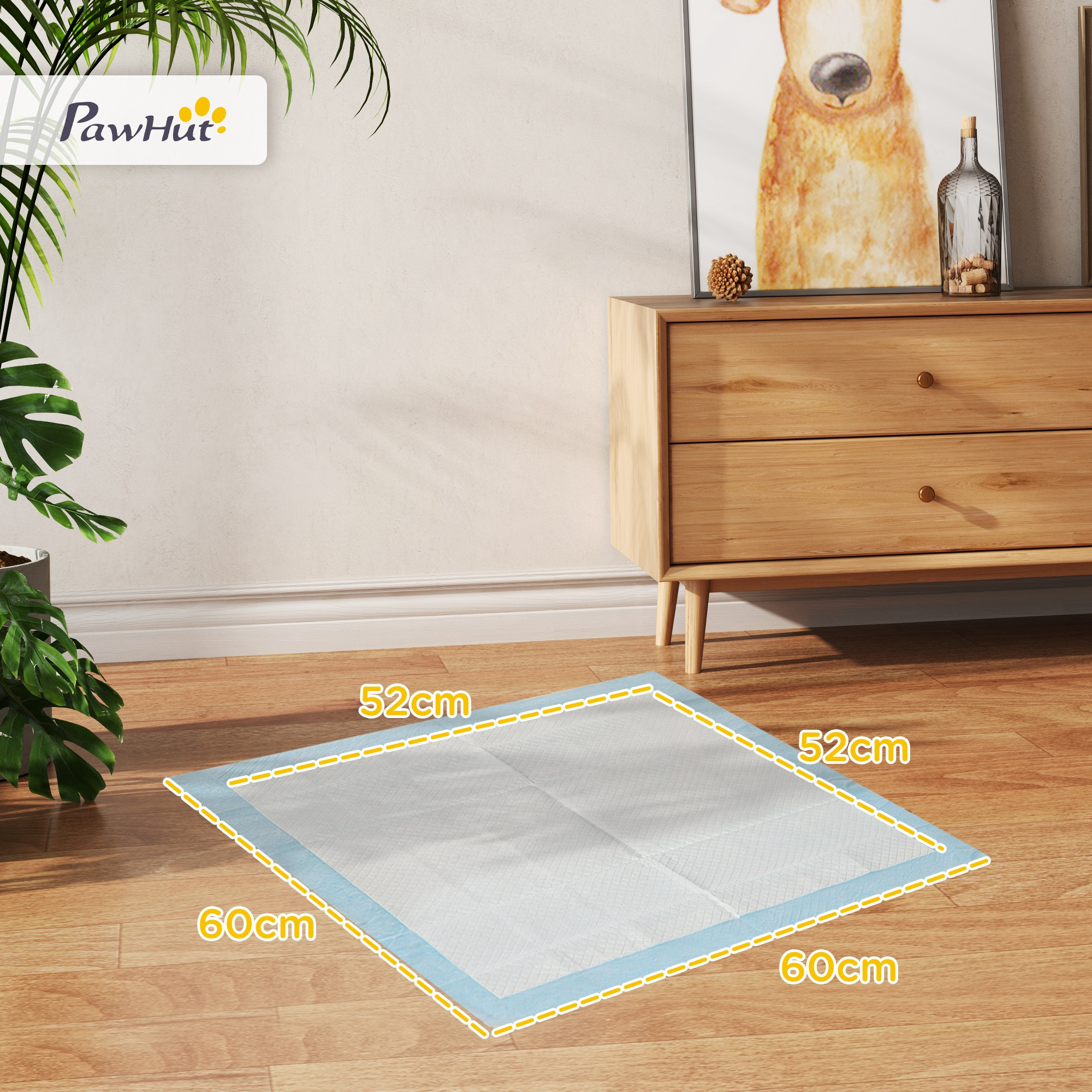 Una almohadilla de entrenamiento para mascotas azul con un borde azul claro sobre un piso de madera. Se muestran las dimensiones y es visible el logotipo de PawHut.