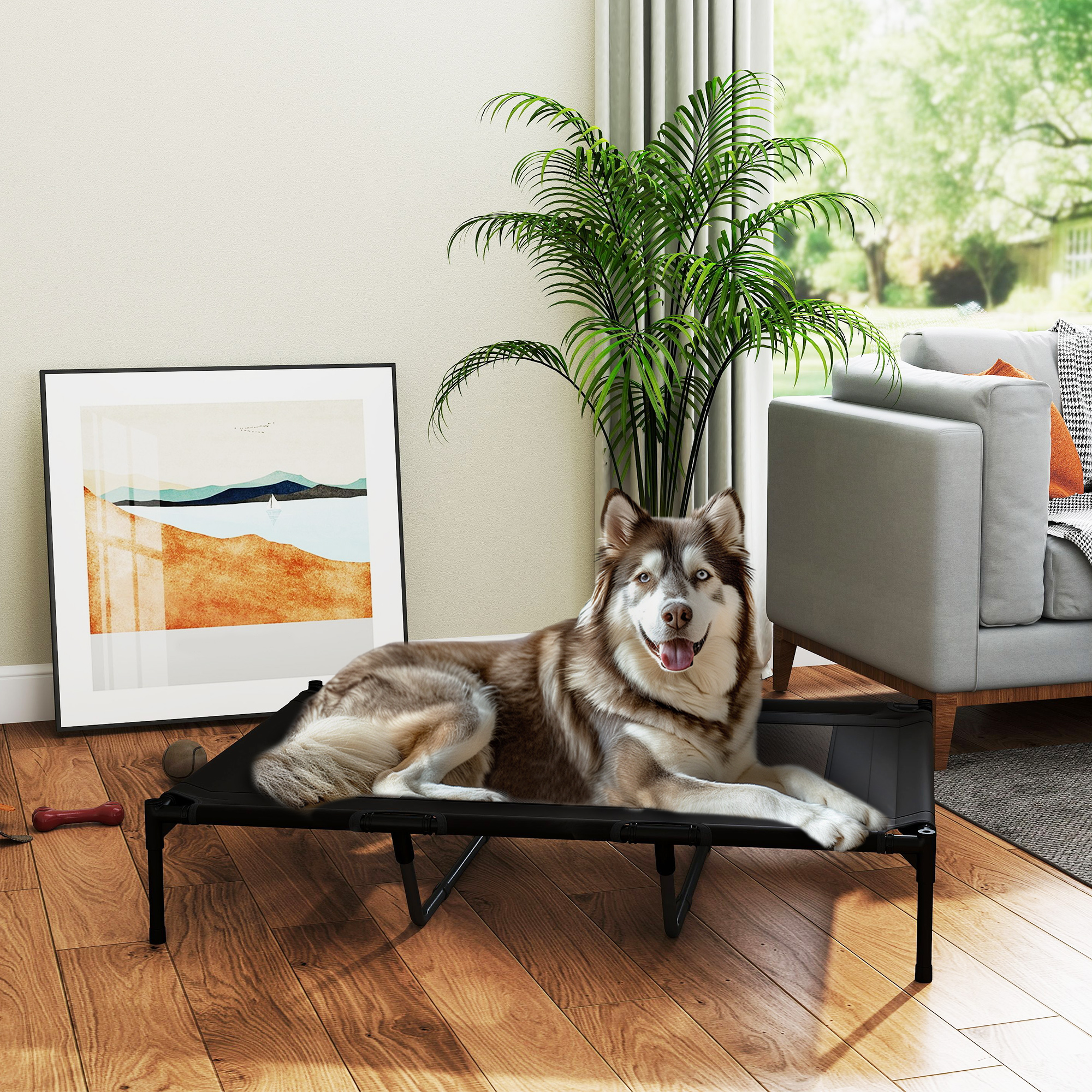 Un perro yace en una cama para perros en una casa. Una planta y arte están en el fondo.