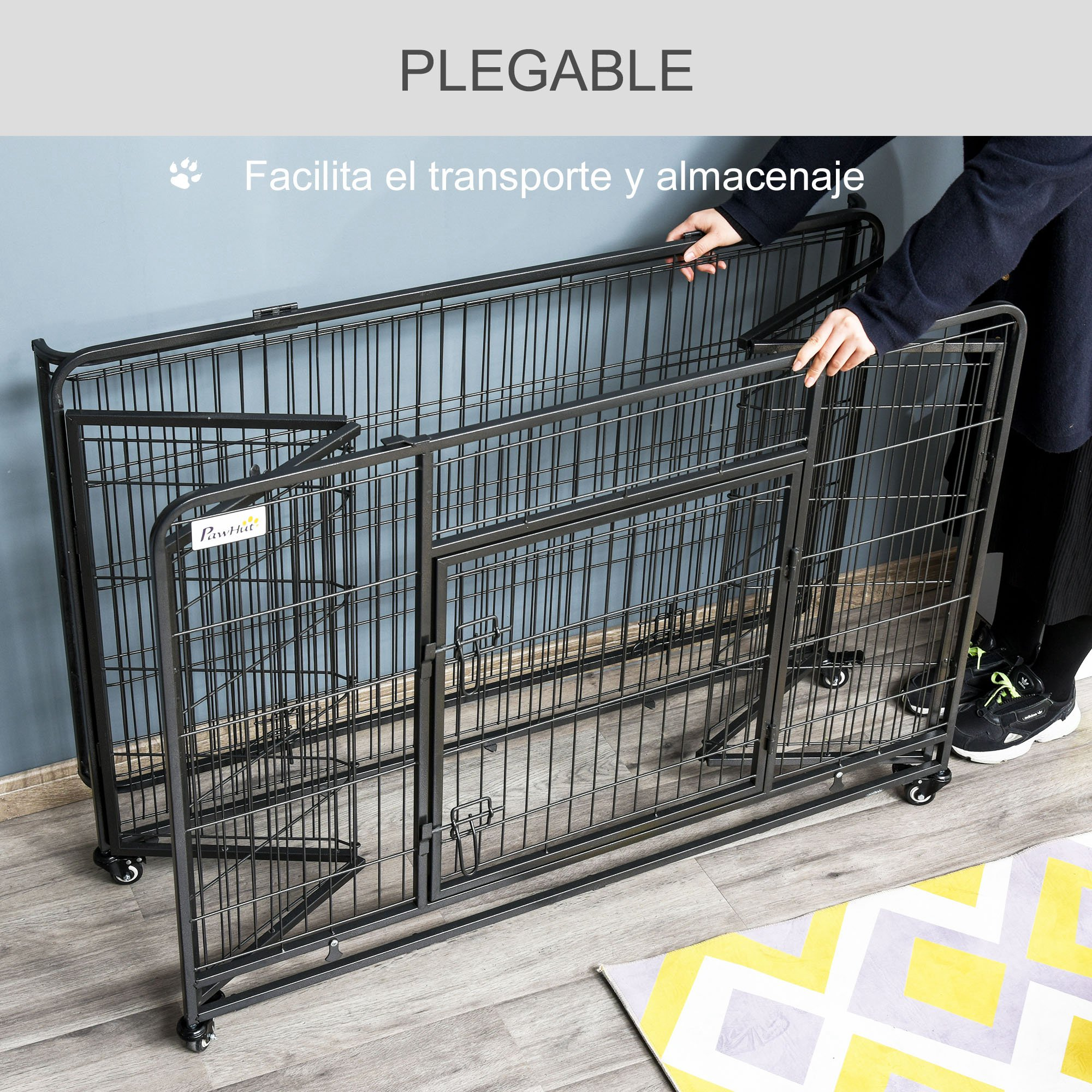 Parque para perros plegable, negro, con ruedas. Se muestran dos secciones, una plegada, otra abierta.
