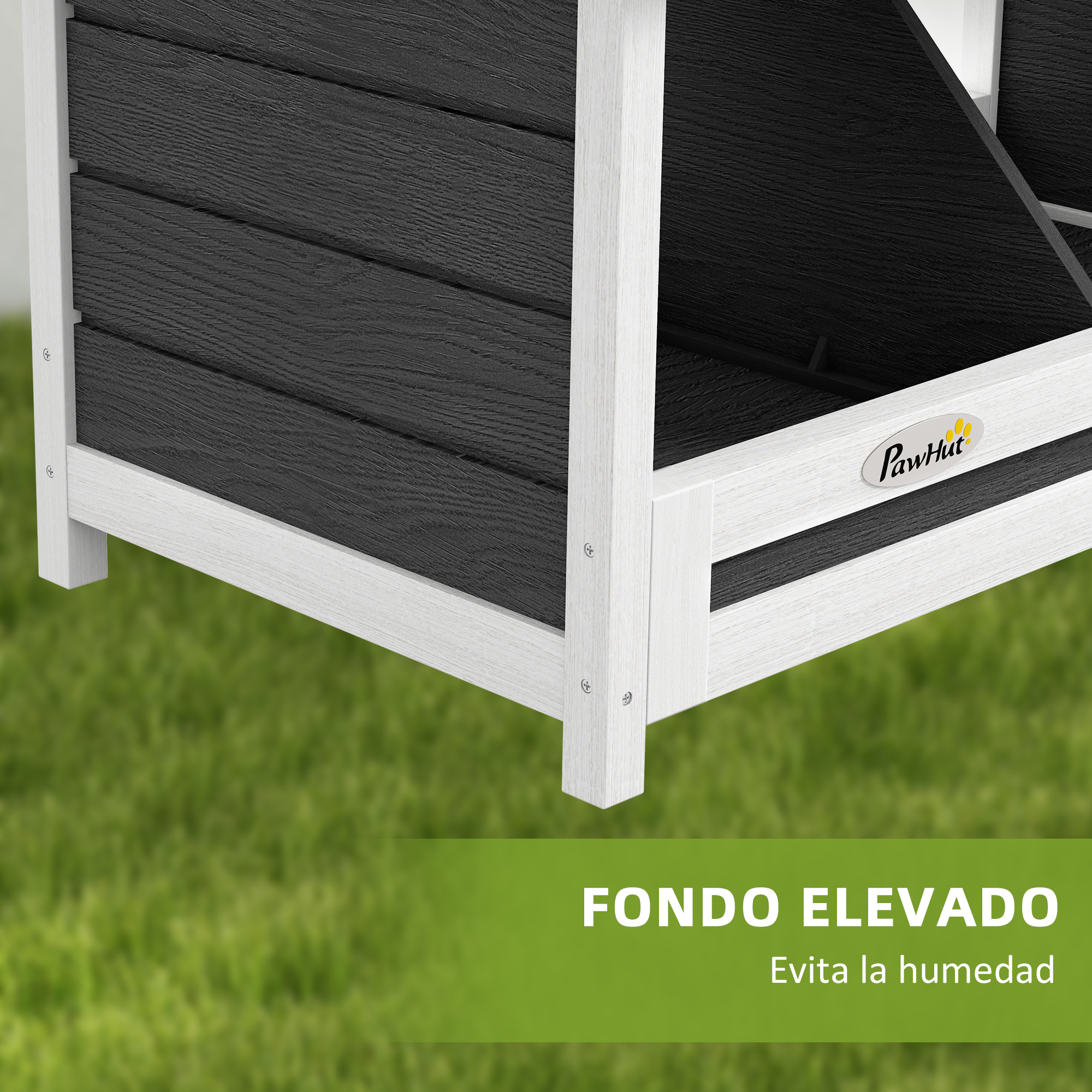 Un primer plano de una esquina de casa para mascotas blanca y gris con suelo elevado, evitando la humedad.