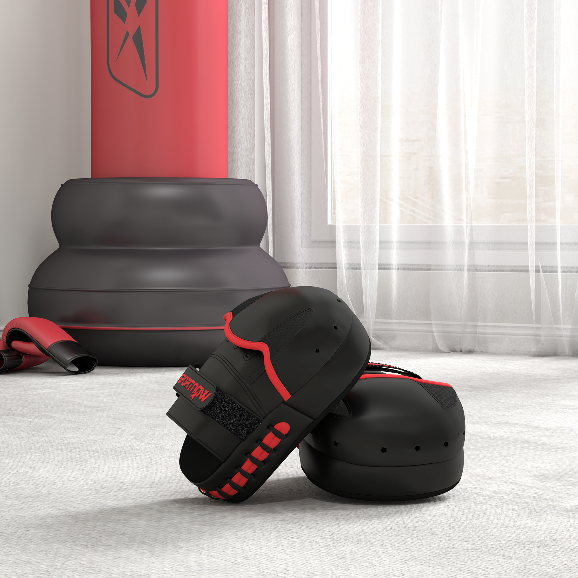 Guantes de boxeo negros y un saco de boxeo. La bolsa y los guantes están en un suelo blanco.