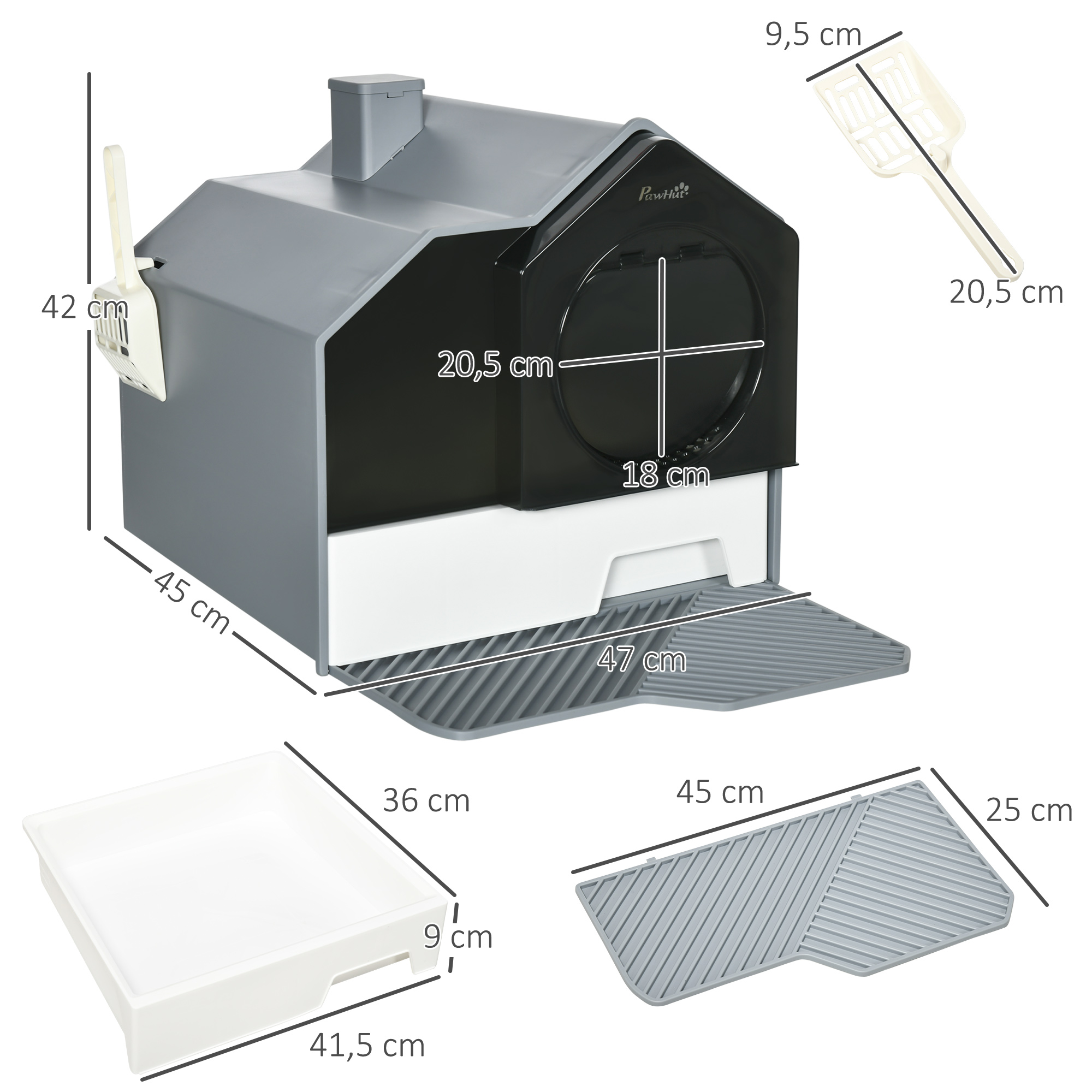 Una caja de arena gris y negra con dimensiones, una pala y una alfombra, sobre una superficie blanca.