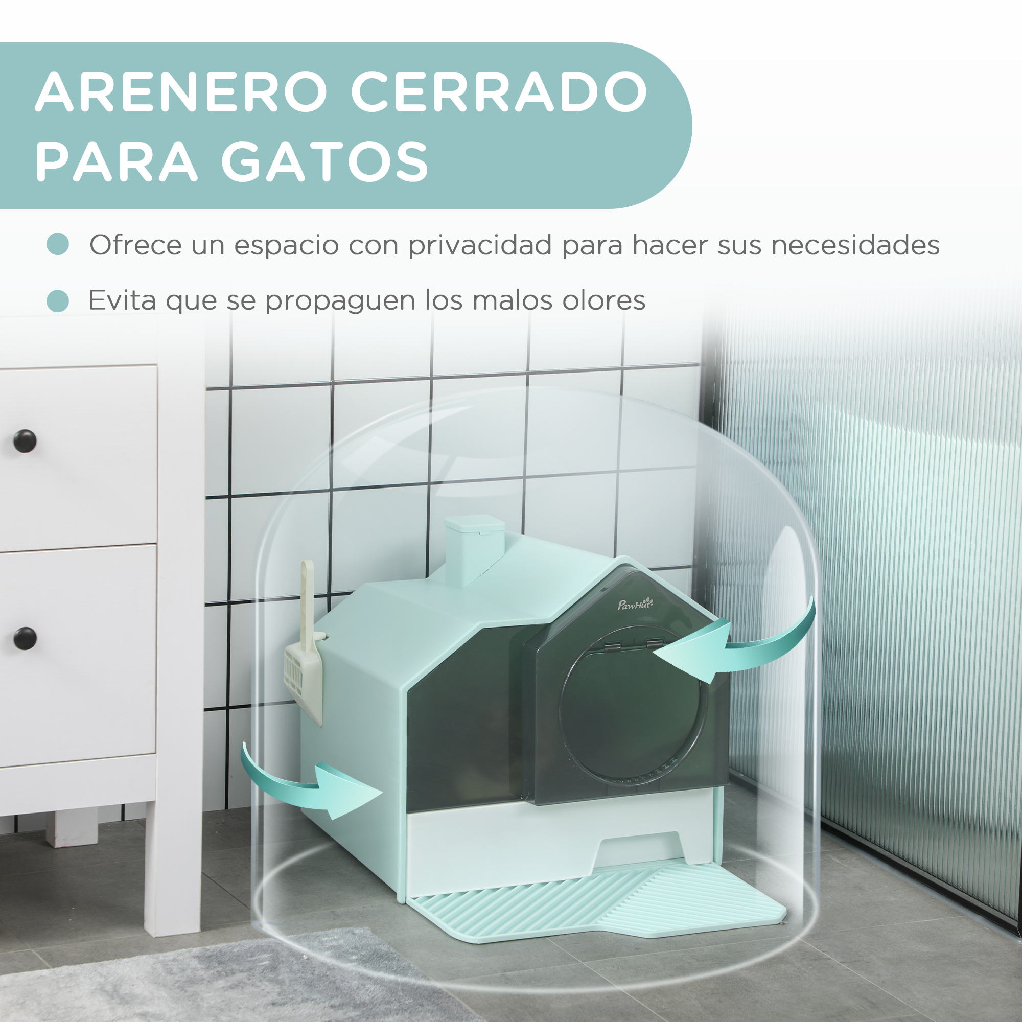Arenero cerrado para gatos en forma de casa. Tiene una pala y está sobre un suelo embaldosado.