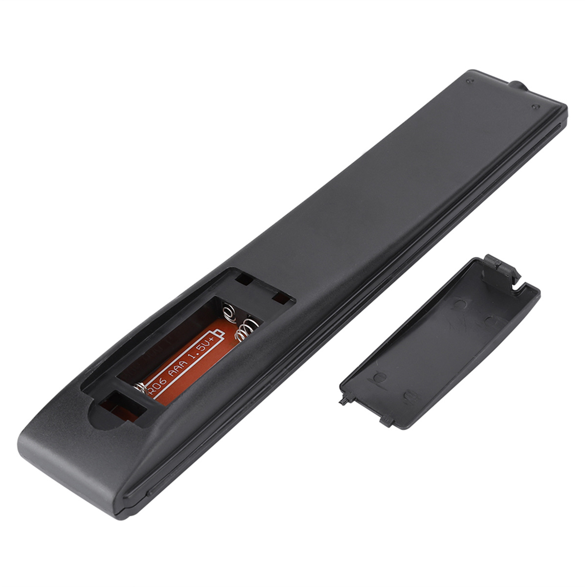 Die Innenseite einer Fernbedienung, die das Batteriefach mit einer Batterie zeigt.
