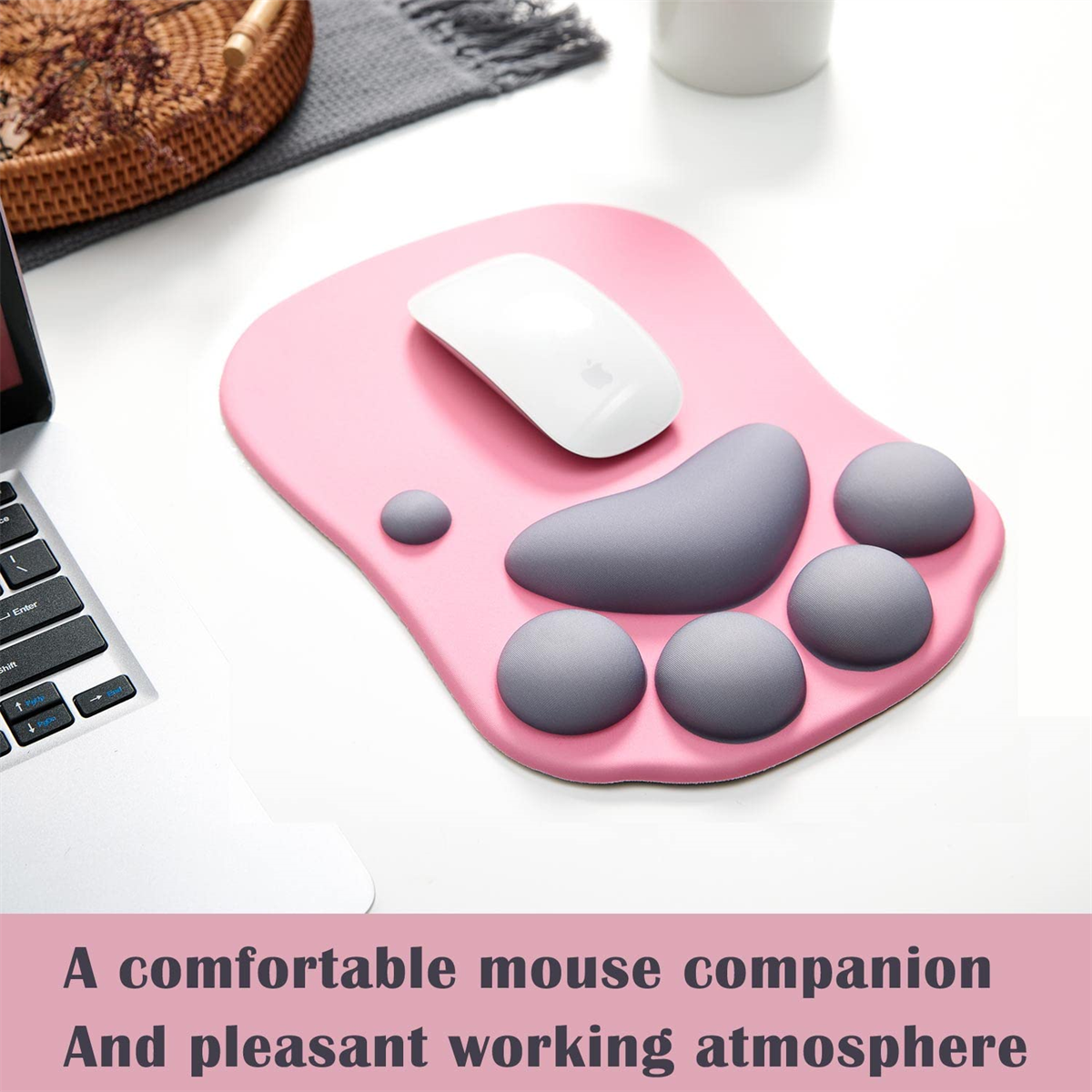 Rosa Mousepad mit grauen Pfoten. Weiße Maus oben. Text: komfortables Arbeiten.