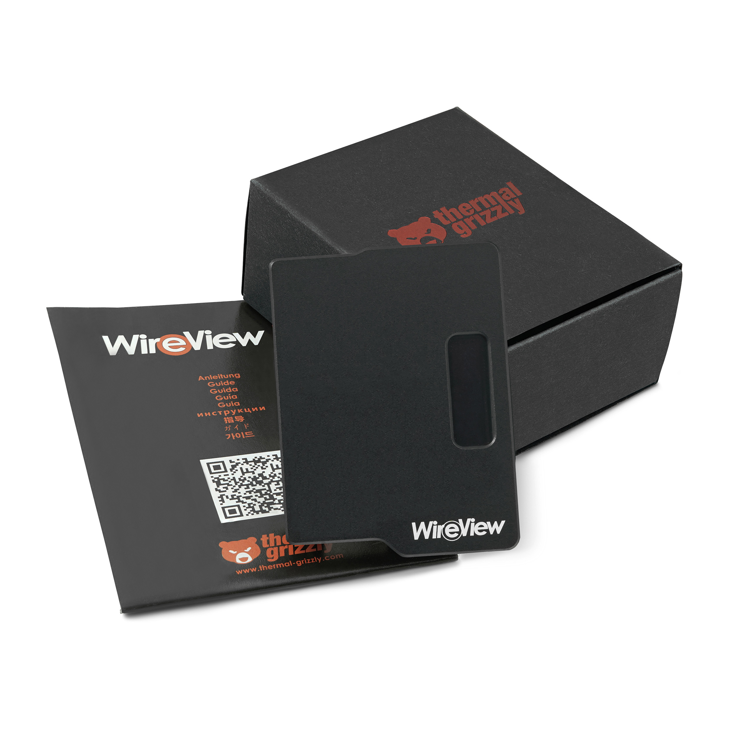 Schwarze Box mit 'thermal grizzly' und 'wireview' Branding, mit einer schwarzen Karte darin.