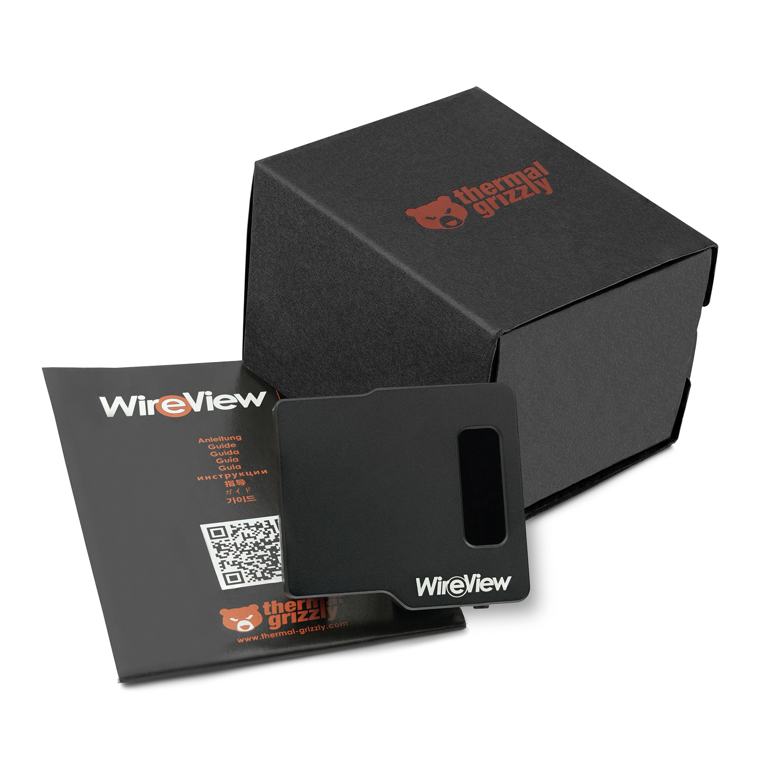 Scatola nera con dispositivo nero e istruzioni. Testo: WireView e logo thermal grizzly.