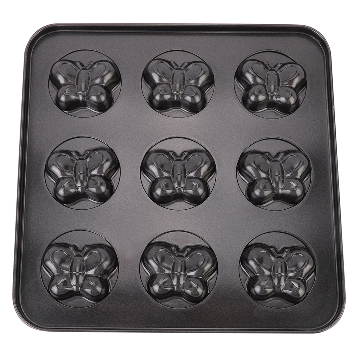 Eine schwarze Backform mit neun schmetterlingsförmigen Formen, in einem 3x3-Raster angeordnet.