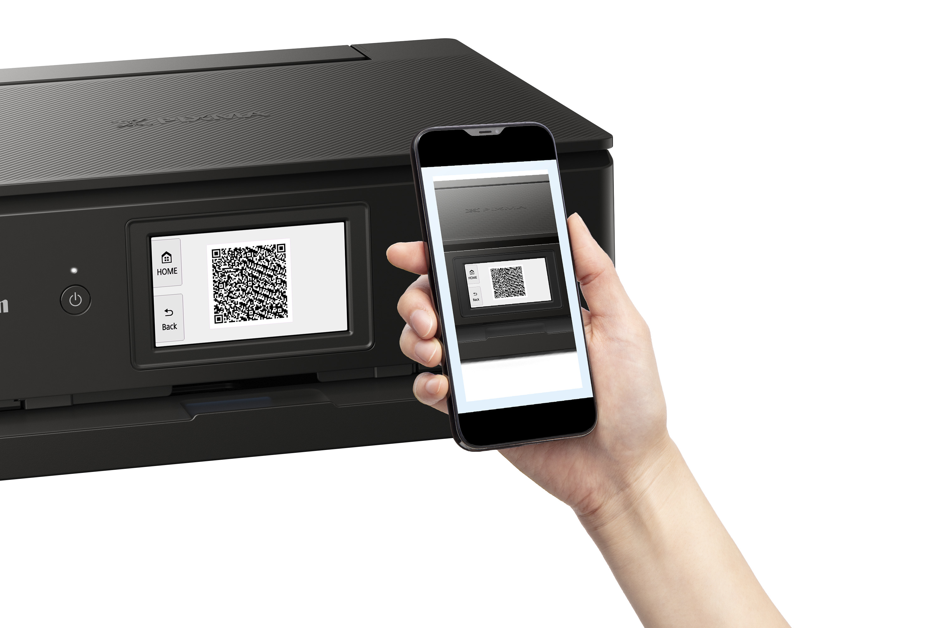 Una mano che tiene un telefono che mostra un codice QR da una stampante Canon. La stampante è nera.