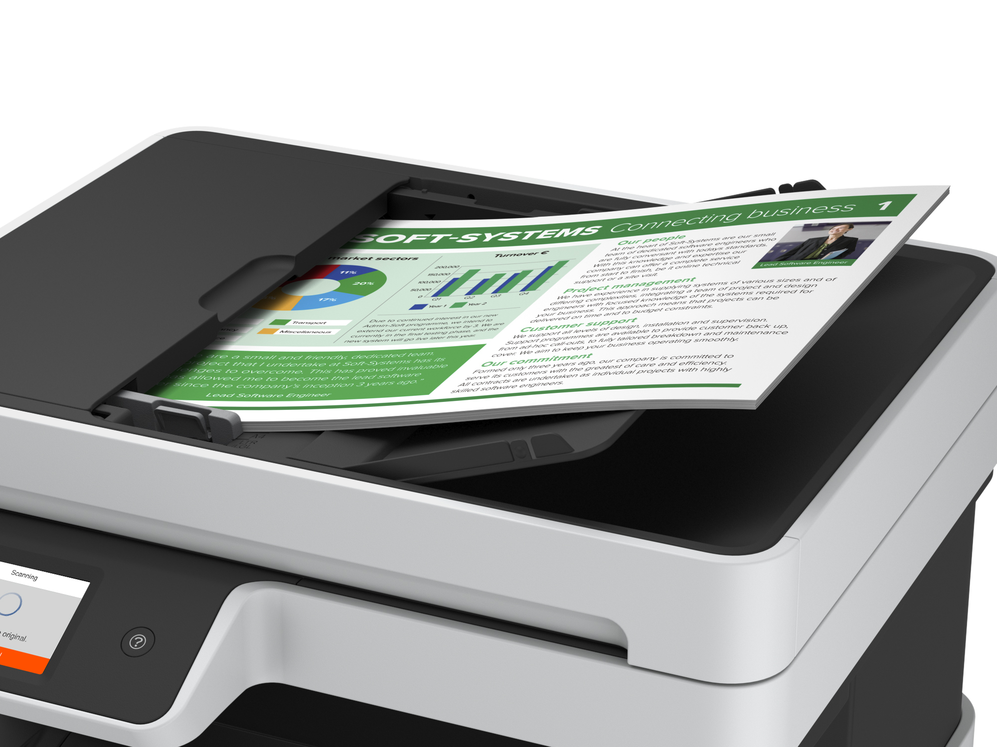 Drukarka HP z dokumentem w trakcie przesyłania. Na dokumencie napisano Soft-Systems Connecting Business.