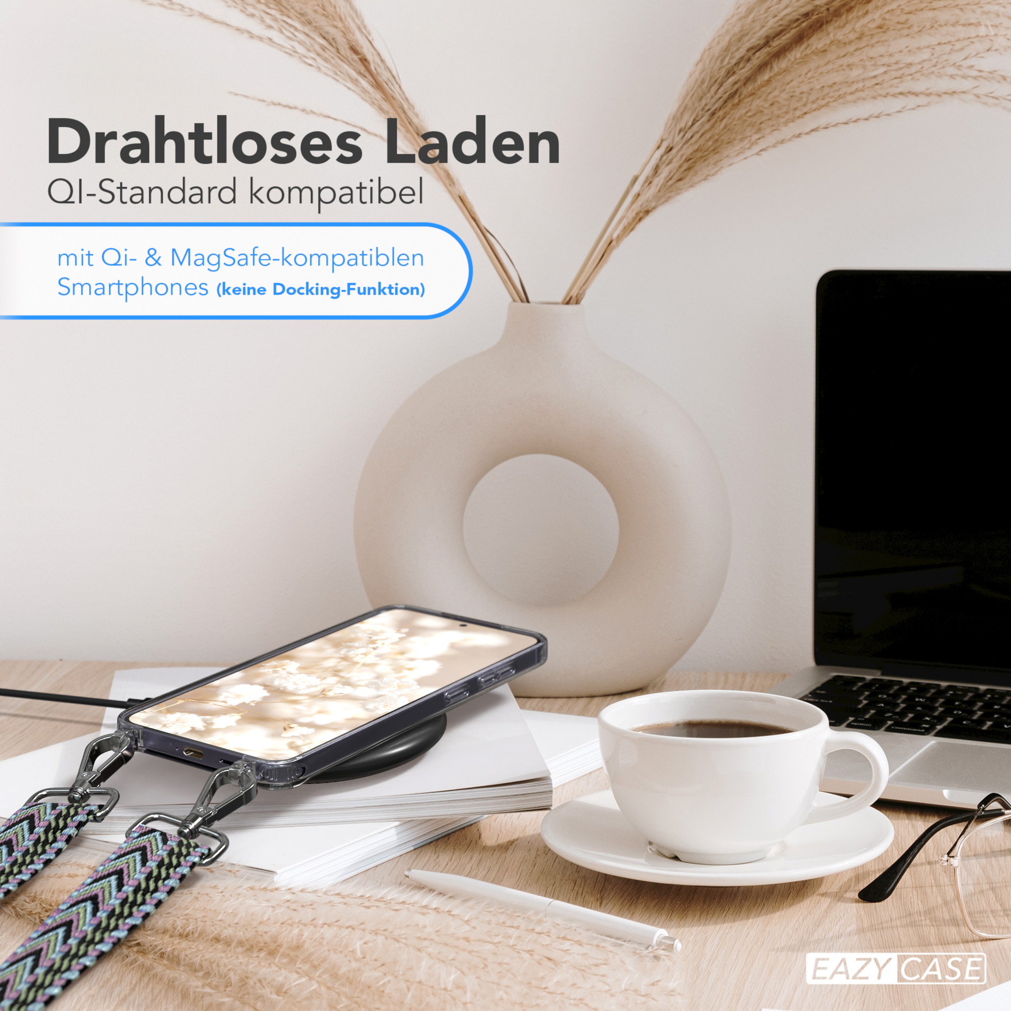 Ein Telefon auf einem kabellosen Ladegerät mit einem Band in einem Raum mit Kaffee.