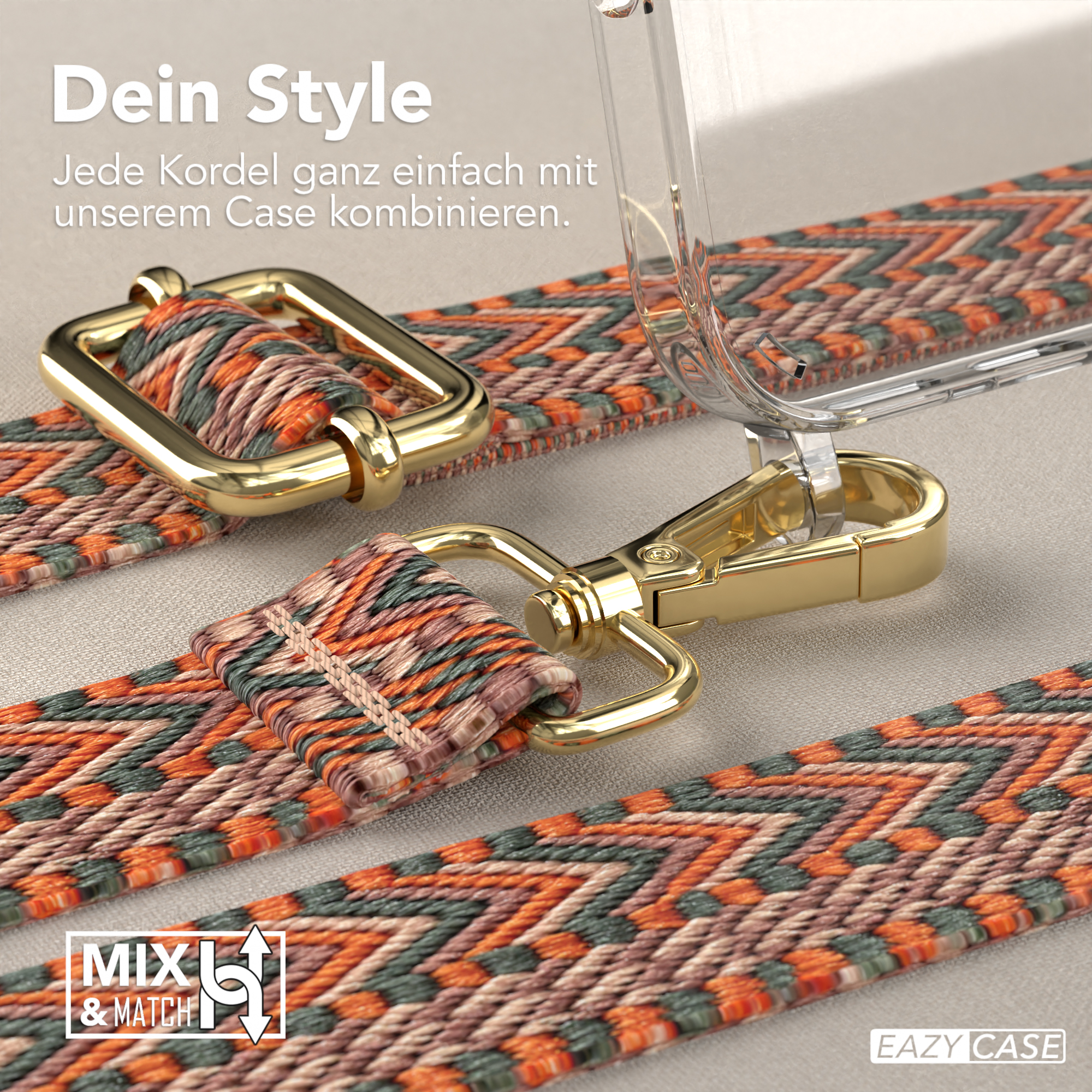 Nahaufnahme eines orange, grün und beige gemusterten Riemens mit goldener Hardware und einer durchsichtigen Handyhülle.